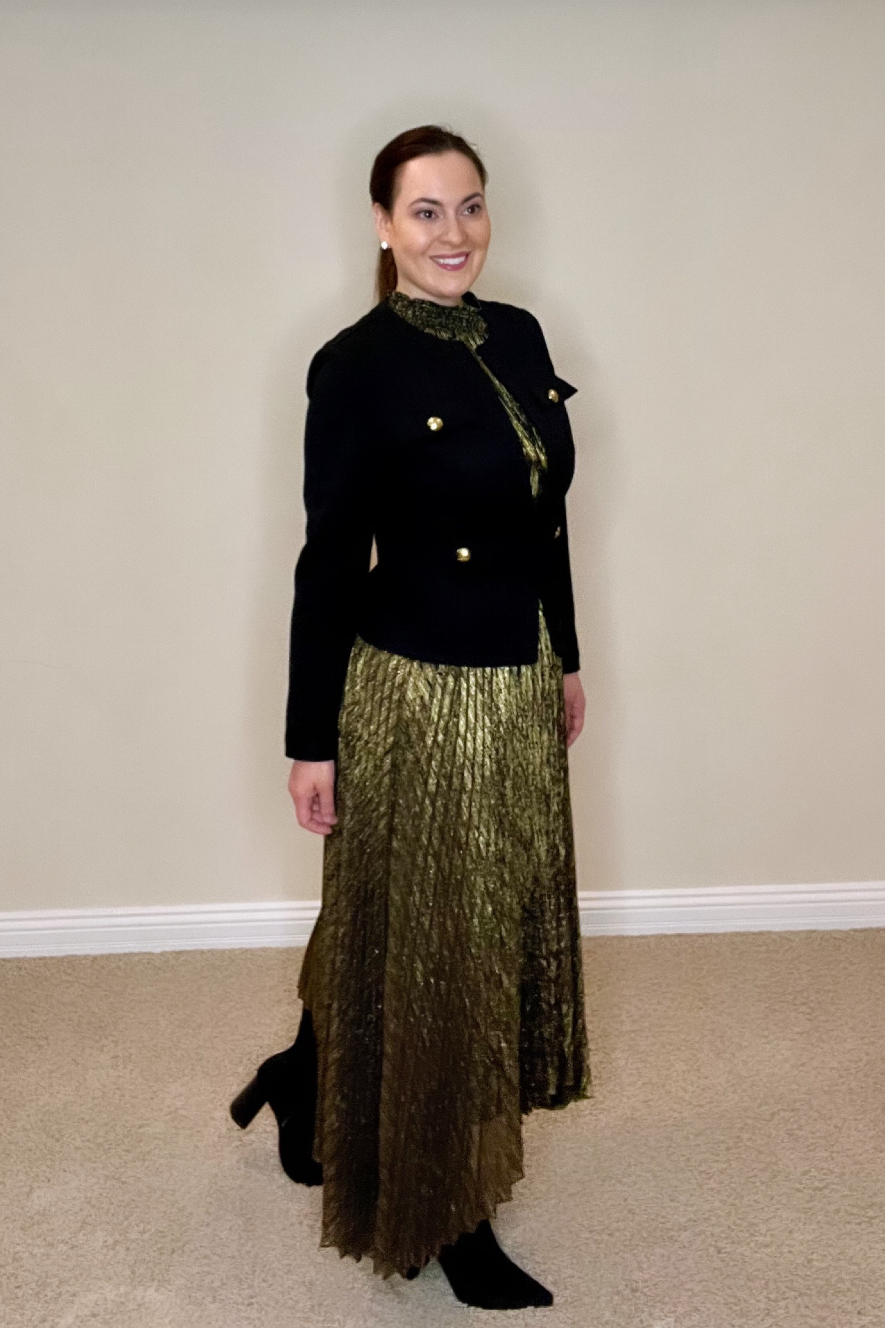 Twelve Days of Holiday Outfit Ideas - sometimes you may already have something in your closet. This is a gold sleeveless halter style midi dress I wore last year. I wanted to make it look new so this year I styled it with a blazer and booties which gives it a more casual holiday vibe. 

#LTKstyletip #LTKHoliday #LTKover40