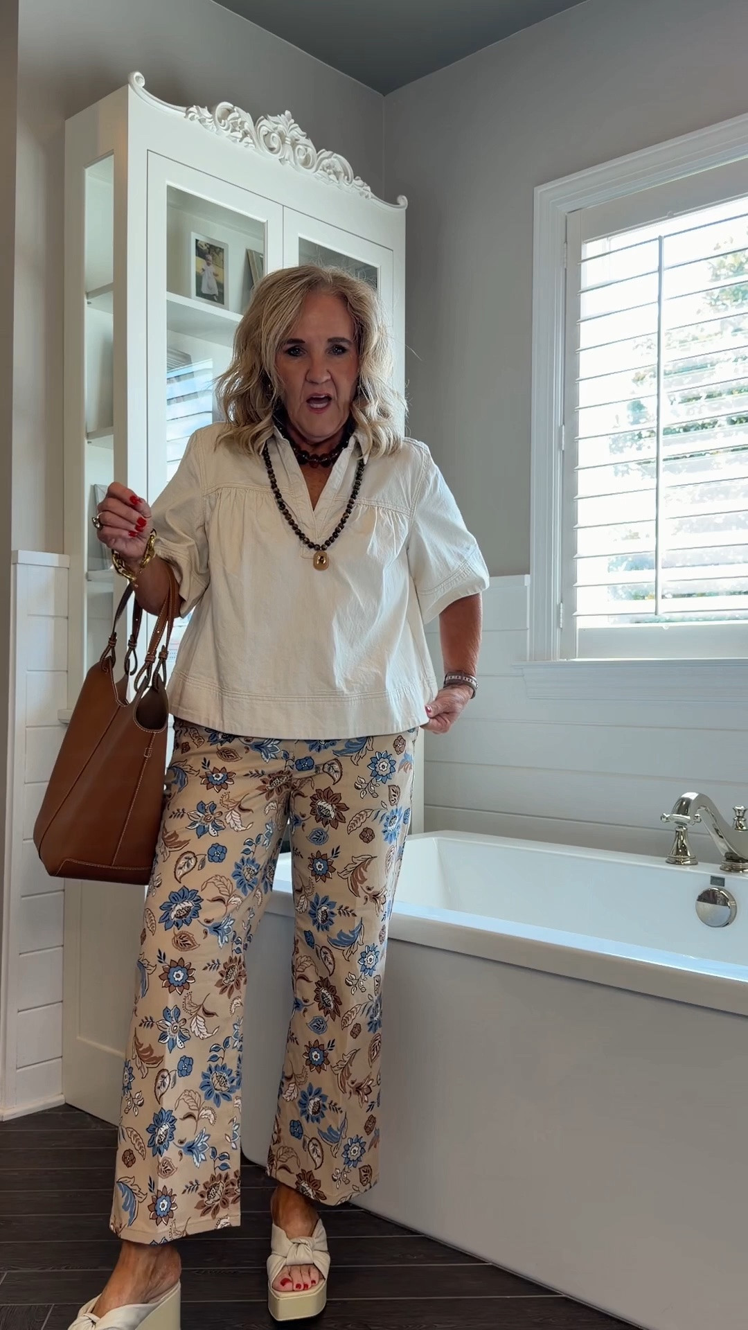 Top size med 
Pants 8 petite 
Cute outfit to wear now and on into fall. You can pair these pants with a chunk of your sweater and boots as the weather turns cooler.

Printed pants, fall outfit, business, casual teacher outfit

#LTKOver40 #LTKSaleAlert #LTKootd