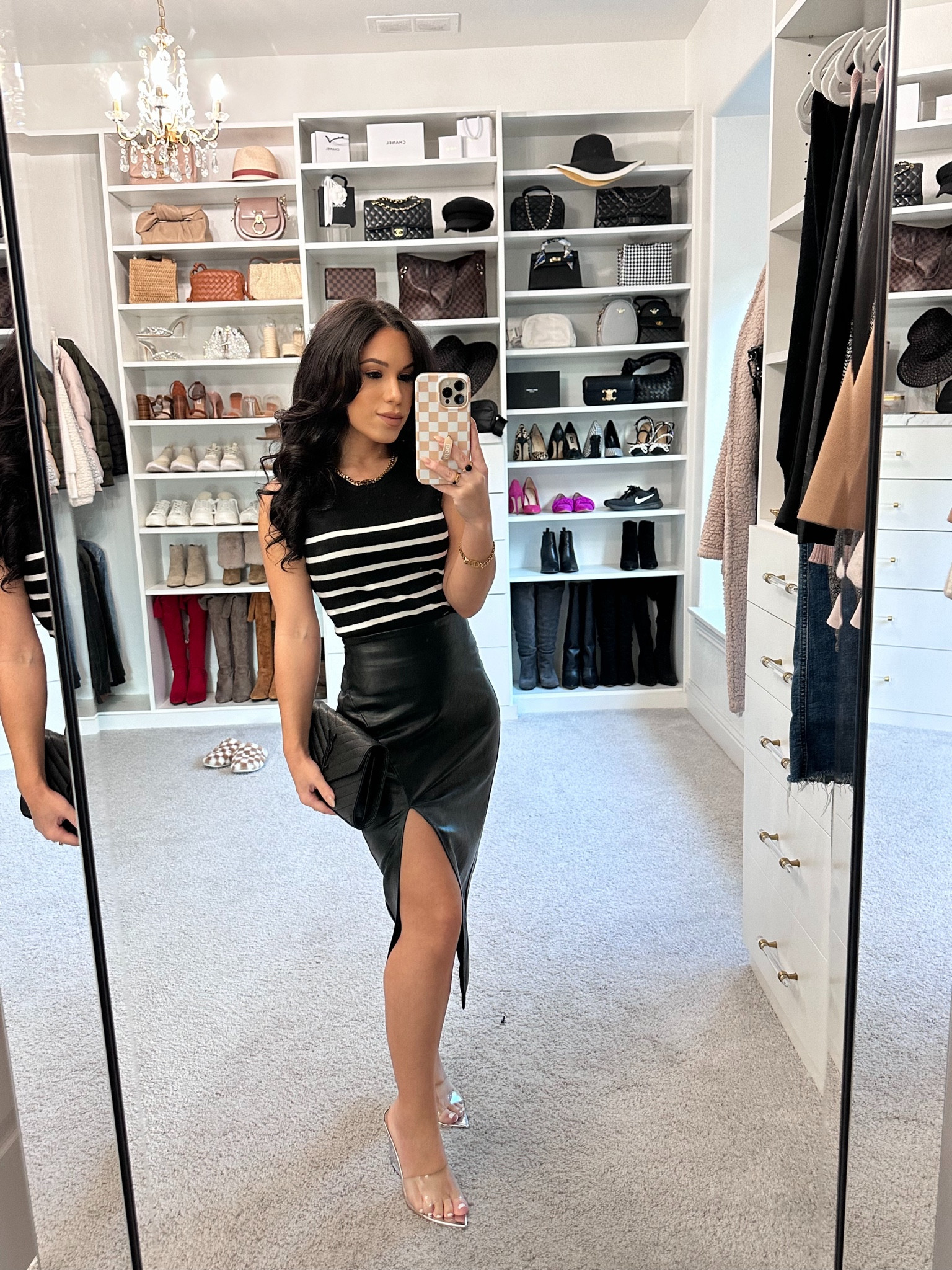 Styling faux leather for Spring! This knit top also has a 15% off coupon! 

Faux leather midi skirt size xxs
Striped knit tank size xs 
Clear heels
YSL chain wallet 
Gold jewelry

Spring outfit, workwear, office outfit, happy hour outfit, date night 

#LTKSeasonal #LTKworkwear #LTKstyletip