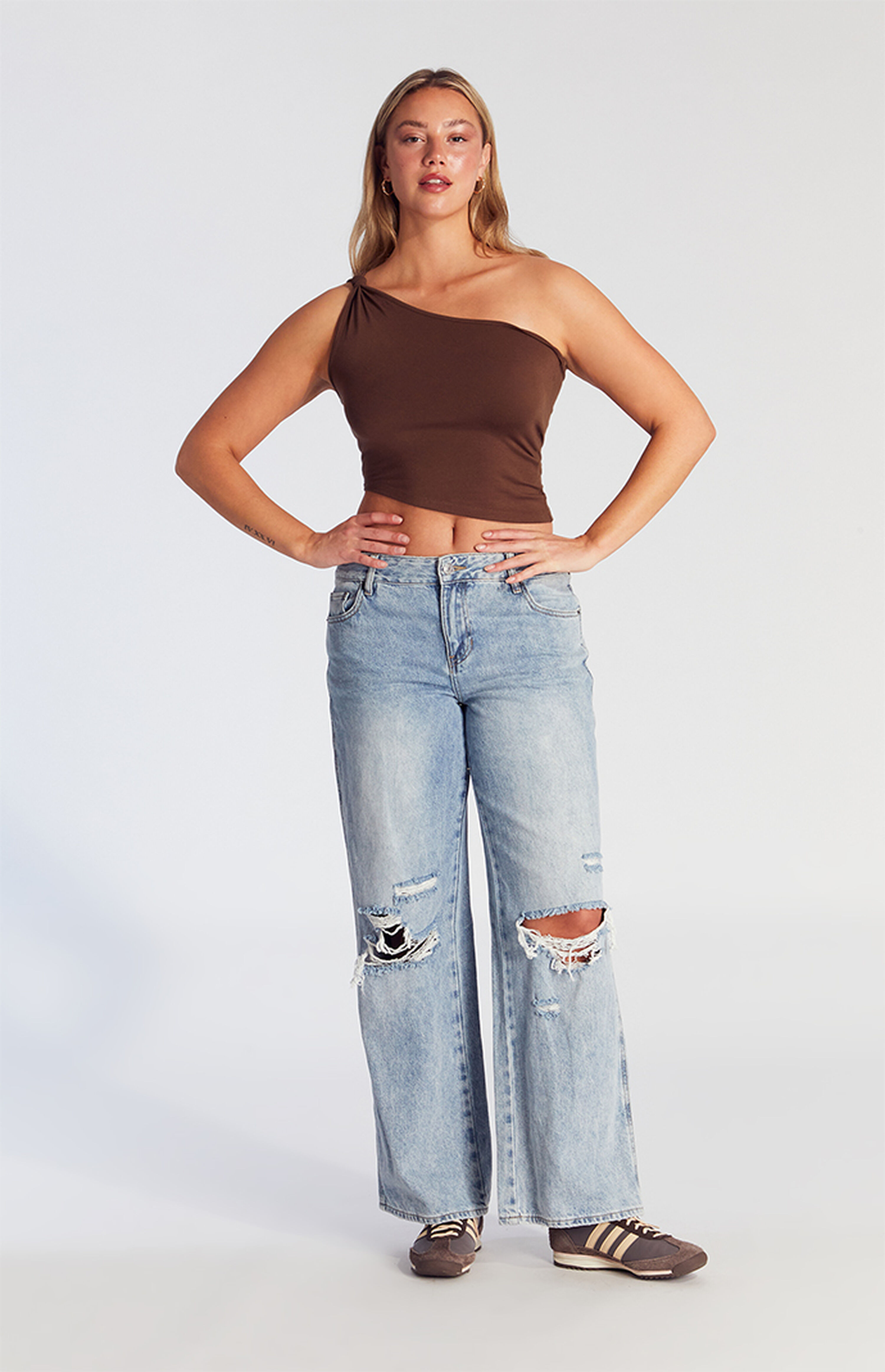 PacSun Casey Medium Indigo Ripped Knee Low Rise Baggy Jeans | PacSun