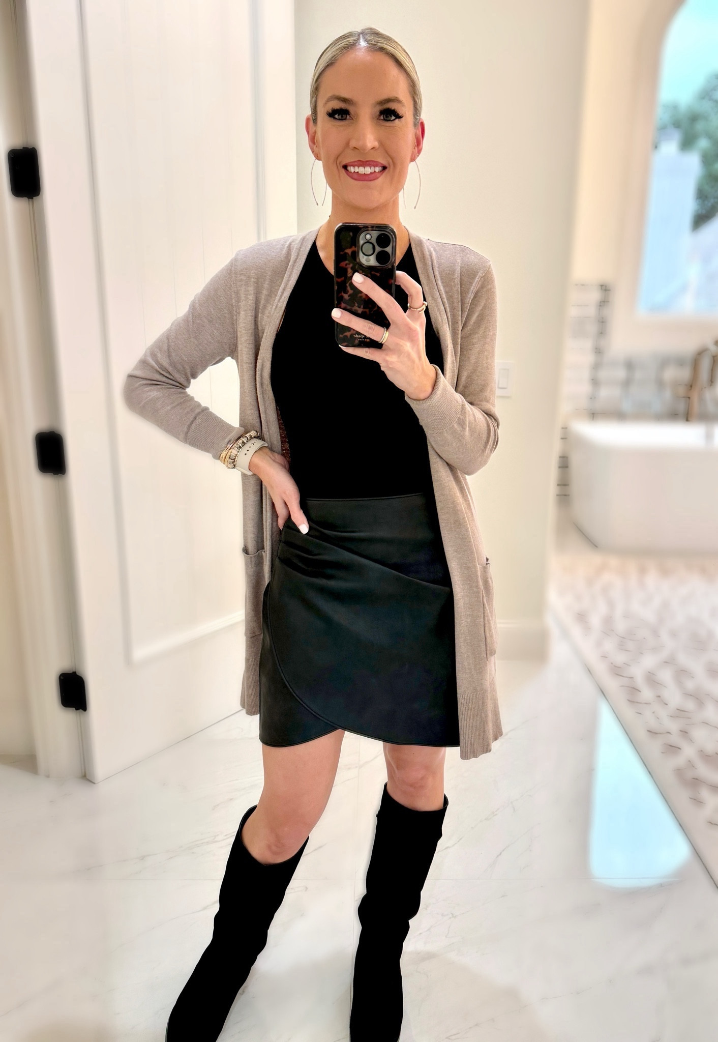 🌲 Holiday Outfit for Hosting 🌲

Holiday hosting can take a toll so it’s best to wear something comfortable like flat or low heeled boots and something with stretch for bending and stooping. 

Pair a comfortable bodysuit with a skirt or skort and add in a cardigan that you can take off if you get too warm. 

This cardigan is light weight and soft and comes in multiple color options. This body suit is sleeveless with a high neck ensuring no issues if I bent over! It was a perfect last minute decision for my Thanksgiving outfit to host 30 people. 

Everything is on sale for Black Friday!! ✨✨✨

#everypiecefits

#LTKsalealert #LTKHoliday #LTKSeasonal