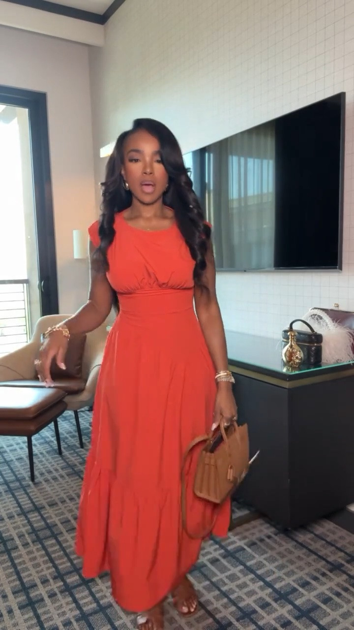 Hi Babes!

This bold coral maxi dress is the perfect combination of effortless and eye-catching. The flattering cinched waist, flowy silhouette, and vibrant color make it one of those dresses that instantly elevates your look with minimal effort. Paired with neutral accessories, it gives that polished vacation-ready feel that photographs beautifully.

If you're petite and curvy, this style is incredibly flattering because the fitted waist creates shape while the flowing skirt adds movement and elongates the body. The bright coral shade is gorgeous against sun-kissed skin and makes a statement without needing much styling.

Where to wear this:
• Vacation dinners
• Resort getaways
• Summer weddings
• Bridal showers
• Date nights
• Cruise evenings
• Special occasions

Undergarments: Nude seamless bra and seamless brief for the smoothest fit.

Everything is linked below.

xx Kira | IG: KirasFashionFinds

34D - 27 - 40 • Size Small or 4

Follow me on Instagram and YouTube @kirasfashionfinds