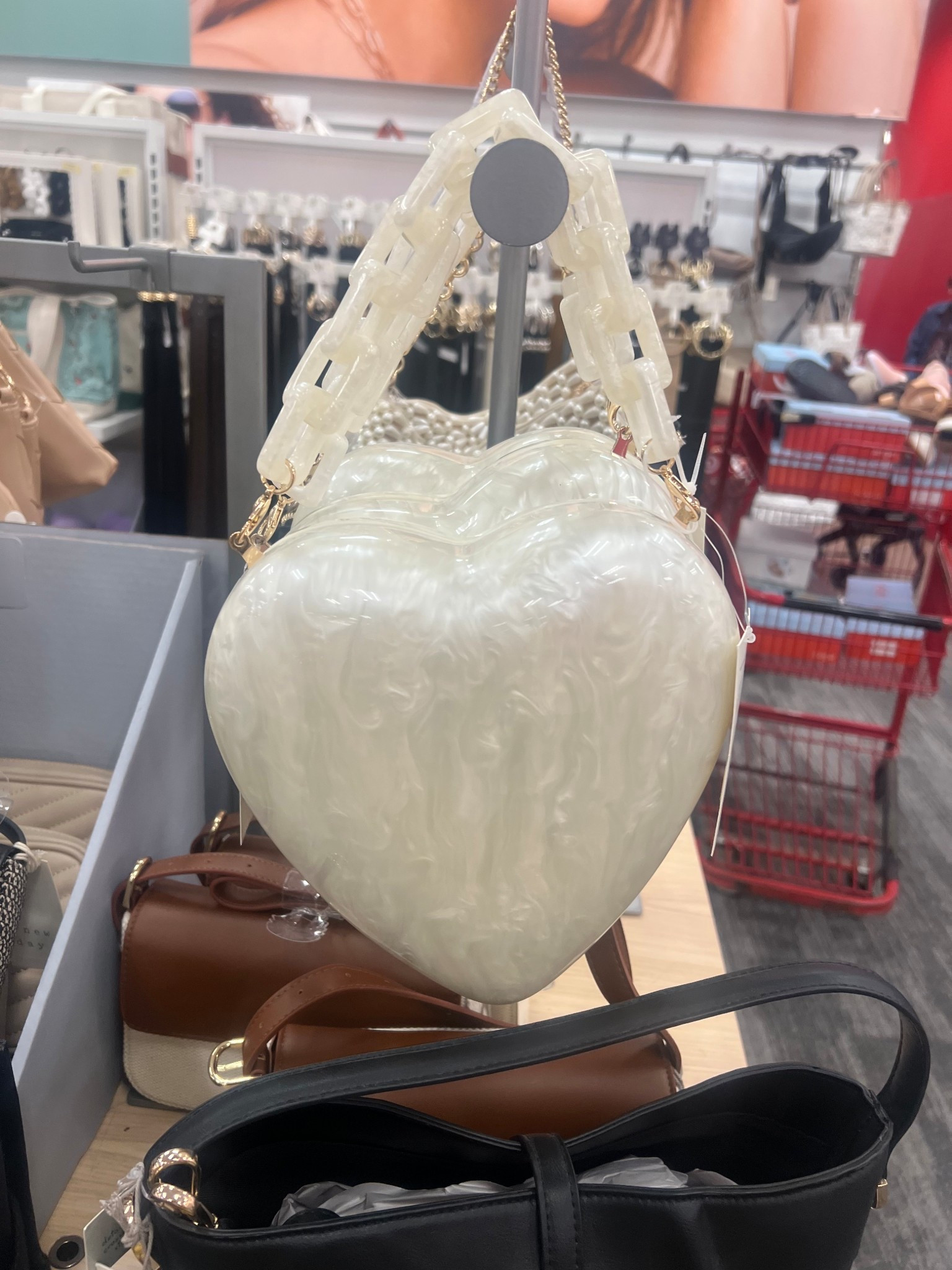 Carry your heart on your sleeve, or better yet, in this heart-shaped bag! 💖 #SpringStyle #OutfitInspo #Handbags 

#LTKOver40 #LTKFindsUnder50 #LTKItBag
