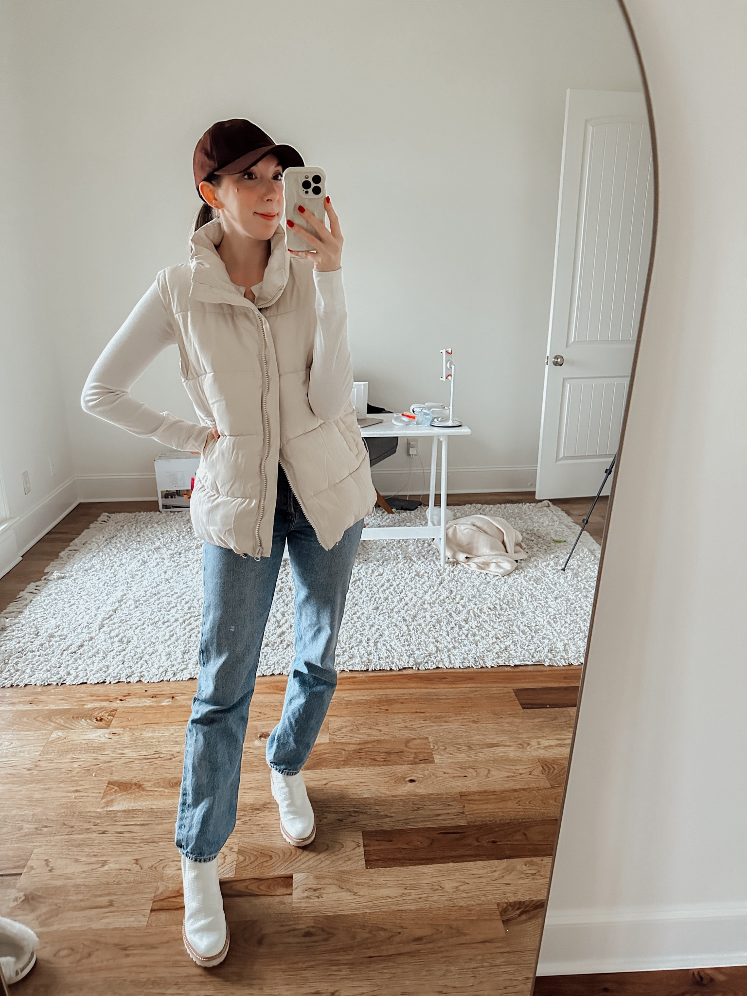 Amazon neutral cream long puffer vest with pockets. Puffer vest outfit idea styled by BarbiGia. Agolde jeans. Straight leg 90s denim outfit 



#LTKfindsunder50 #LTKstyletip #LTKMostLoved