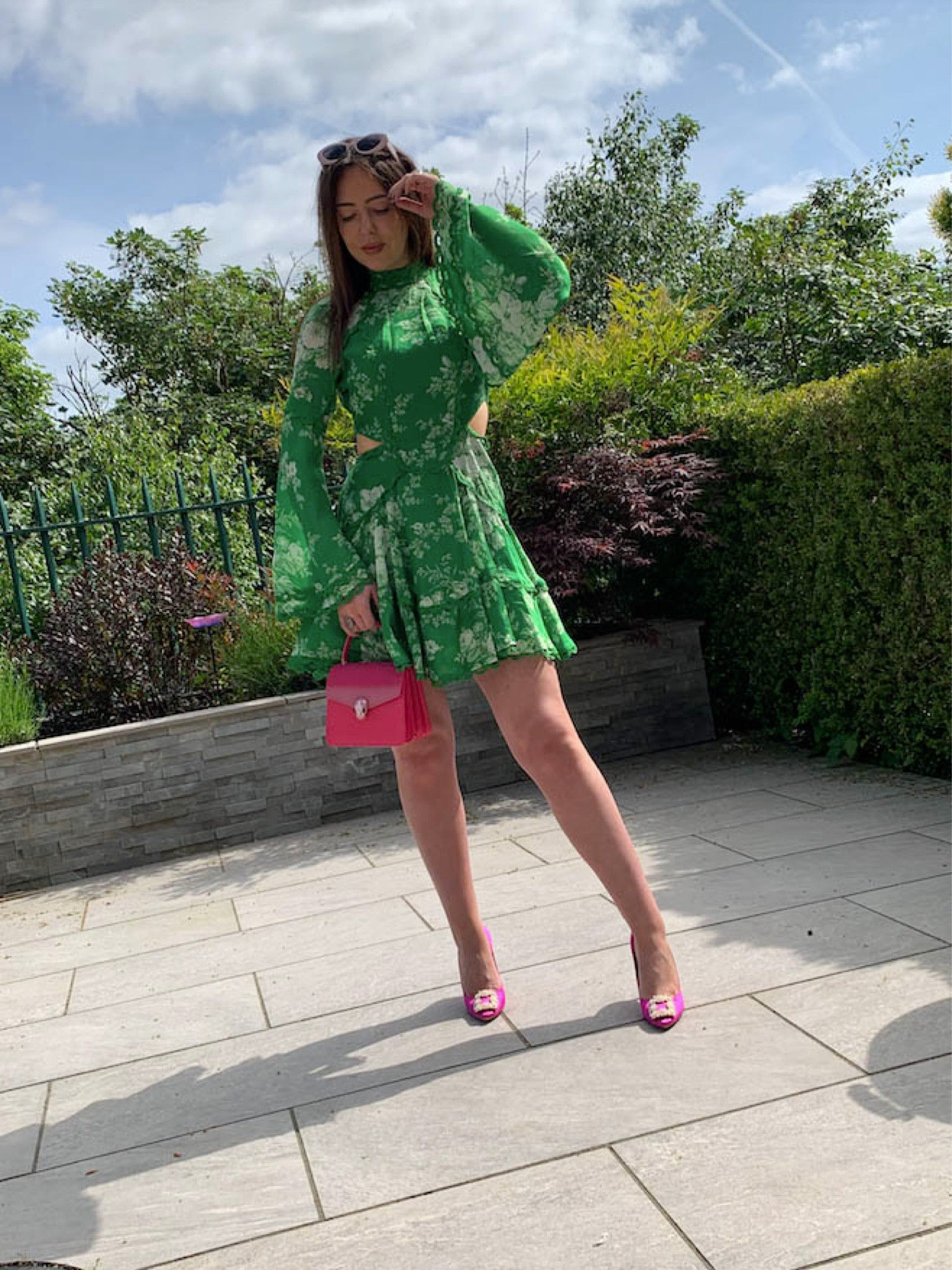 Long sleeve cut out green floral dress, lace dress, pink buckle heels, pink handbag, white sunglasses 

#LTKeurope #LTKSeasonal #LTKstyletip