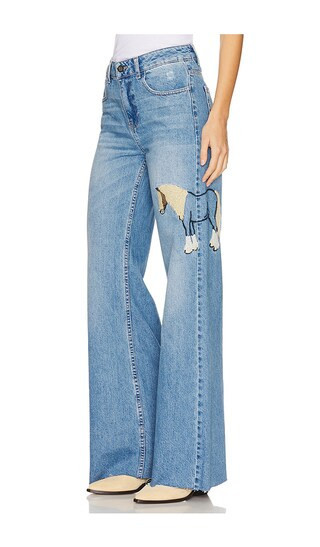 Understated Leather Horsey Jeans in Denim-Light. - size 25 | Revolve Clothing (Global)
