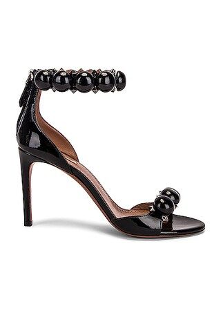 ALAÏA La Bombe Ankle Bracelet Sandals in Black | FWRD 