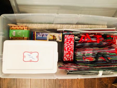 All the holiday gift wrap in one place! Wrap it paper, bows, tags and bags all stored and organized in one container. Your gift wrap station in a portable, inexpensive container. #walmartorganization #targetorganization #budgetorganization #giftwraporganization

#LTKSeasonal #LTKHoliday #LTKhome