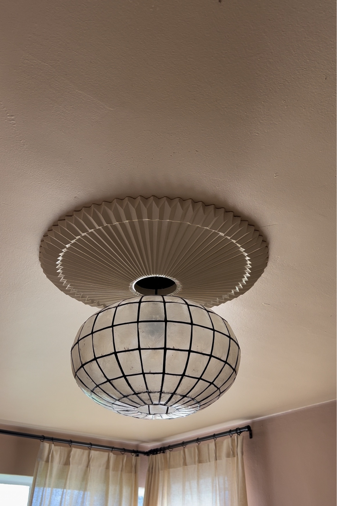 Paintable ceiling medalian and capiz shell pendant light fixture

#LTKHome #LTKStyleTip