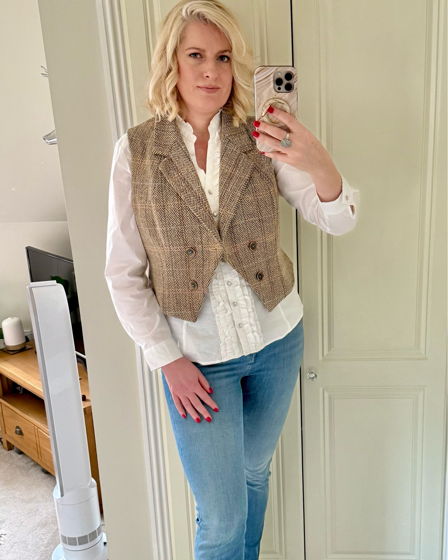 Hi everyone! I love the British country look, it’s so classic & timeless & I think tweed looks fabulous with jeans for a more casual look. I found this gorgeous waistcoat which I’ve worn with my magic shaping jeans & a white ruffle shirt. It’d also look great with smarter trousers for an office outfit for work. To complete the look I’m wearing vintage leather boots in cream. 

U.K. blogger, Joe Browns, Marks & Spencer, M&S, tall, midsize, over 40.