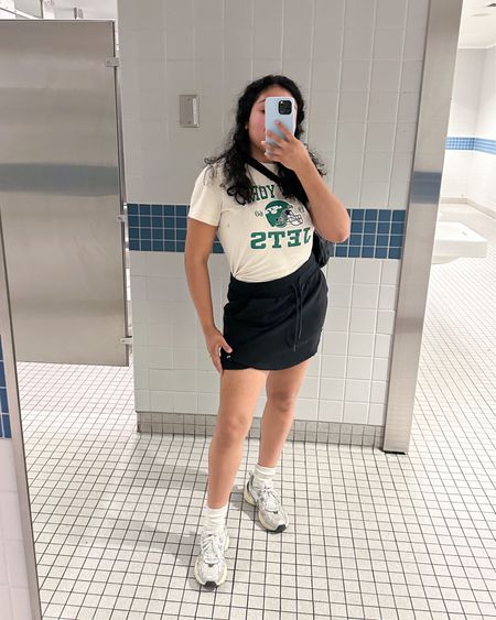 Airport outfit - skort is old JoyLab from Target but linked similar! Fanny pack is by Patagonia and it’s the best! It fits so much! Also linked my favorite sneakers! Nike V2K tts. 

#LTKshoecrush #LTKtravel #LTKitbag