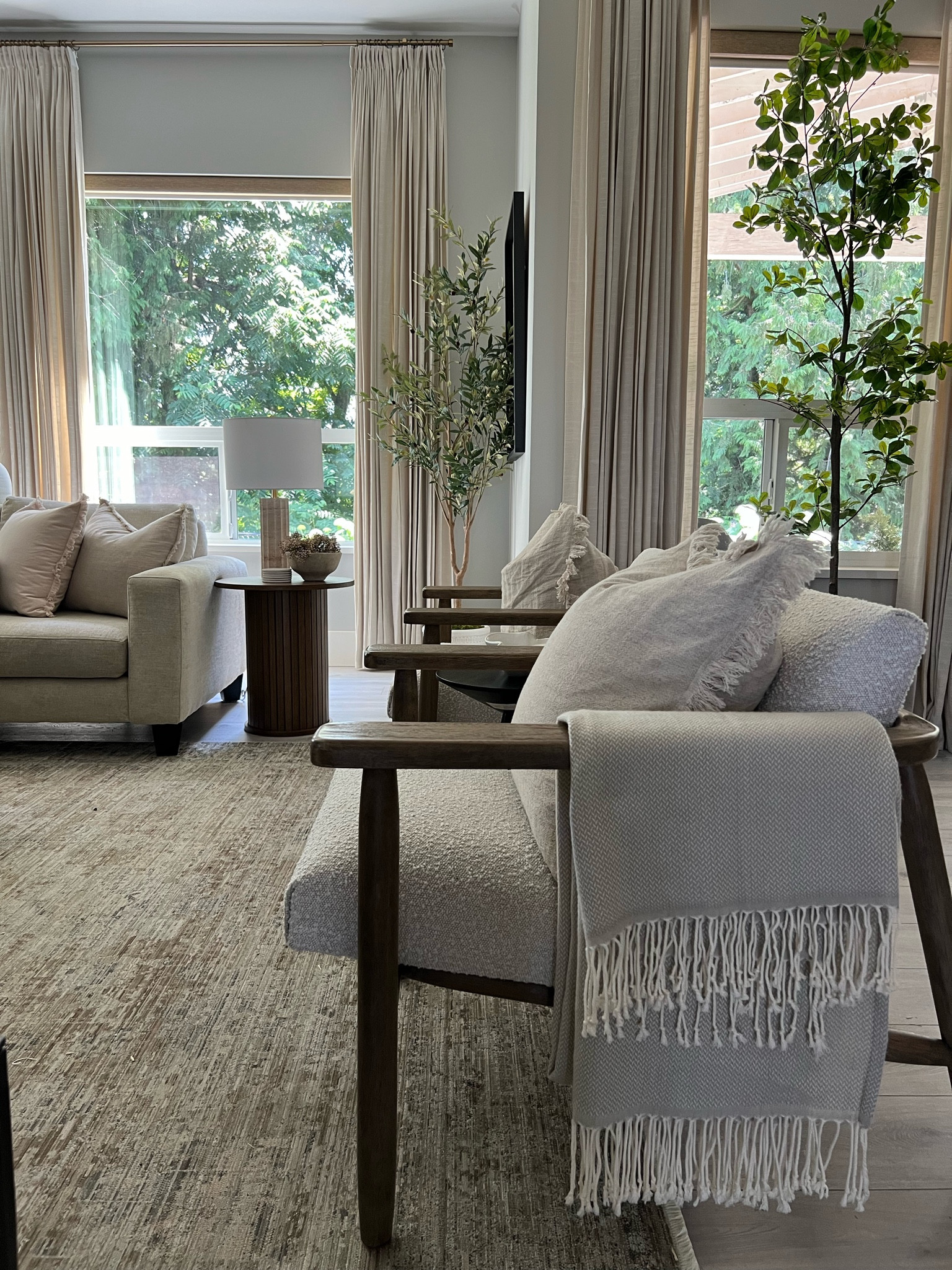 Summer style in my home: light and bright! I’ve got mainly a monochromatic look going on, a few different cream and beige tones, and touches of wood! 
Living room, accent chairs, linen curtains

#LTKFindsUnder100 #LTKHome