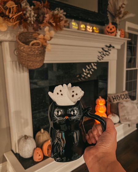 Halloween decor. Black cat mug. Halloween mug. Target mug. Halloween mantle. Fall mantle. Fall decor. Halloween decorations. Halloween party. Bat decorations. Bat decor. Fall arrangement. Fall fireplace decorations. 

#LTKhome #LTKSeasonal #LTKHalloween