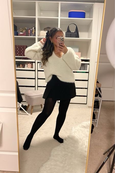 Date night outfit!🫶 

Perfect outfit for holiday parties, or event too❤️

Wearing a white fluffy sweater with a mini skirt and black tights✨ I also paired it with a black coat and my black pointed toes knee high boots! 

#LTKstyletip #LTKmidsize #LTKHoliday