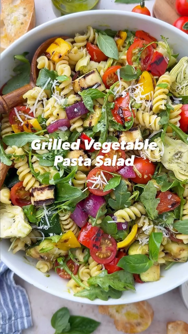 GRILLED VEGETABLE PASTA SALAD

This Grilled Vegetable Pasta Salad is packed with smoky zucchini, sweet peppers, onions, tender pasta, juicy tomatoes, arugula, artichoke hearts, Parmesan cheese, and a vibrant basil vinaigrette. It’s the ultimate summer side dish or light meal, perfect for BBQs, picnics, and easy entertaining!💚 Full recipe on my blog: https://www.twopeasandtheirpod.com/grilled-vegetable-pasta-salad/ 

 #LTKHome #LTKFindsUnder50 #LTKFindsUnder100