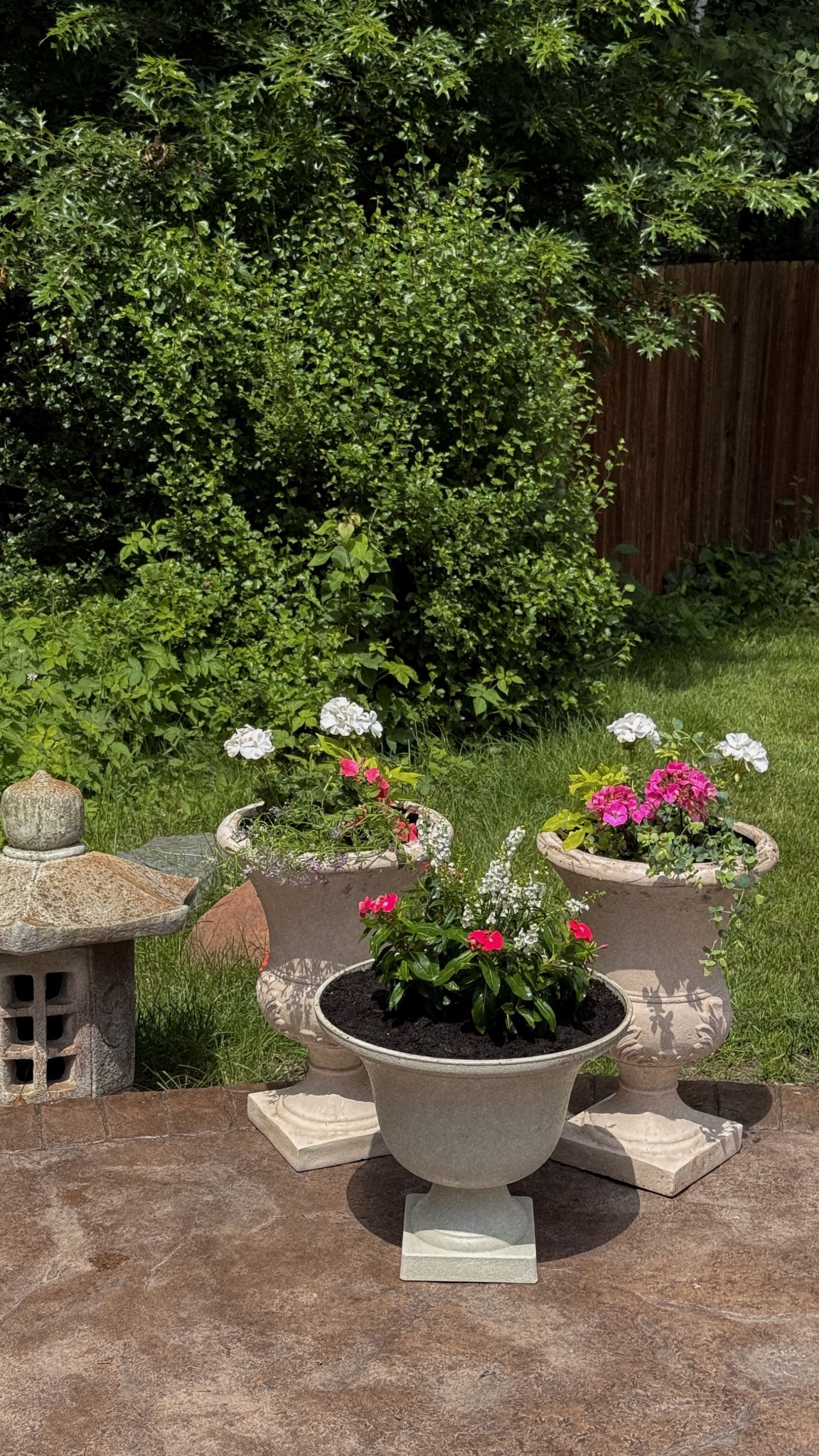 Outdoor urn planter pots 

#LTKHome #LTKSeasonal #LTKSummerEdit