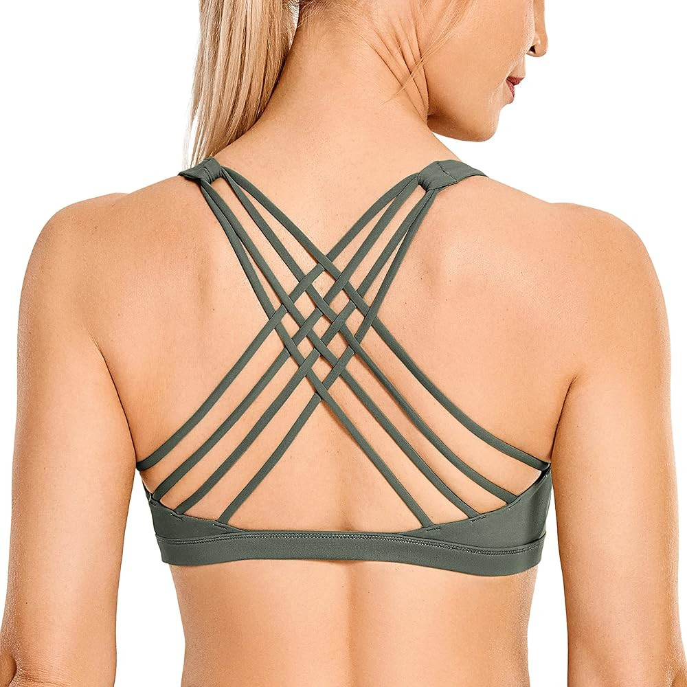 CRZ YOGA Strappy Sports Bras for Women - Criss Cross Back Sexy Wireless Padded Yoga Bra Cute Work... | Amazon (US)