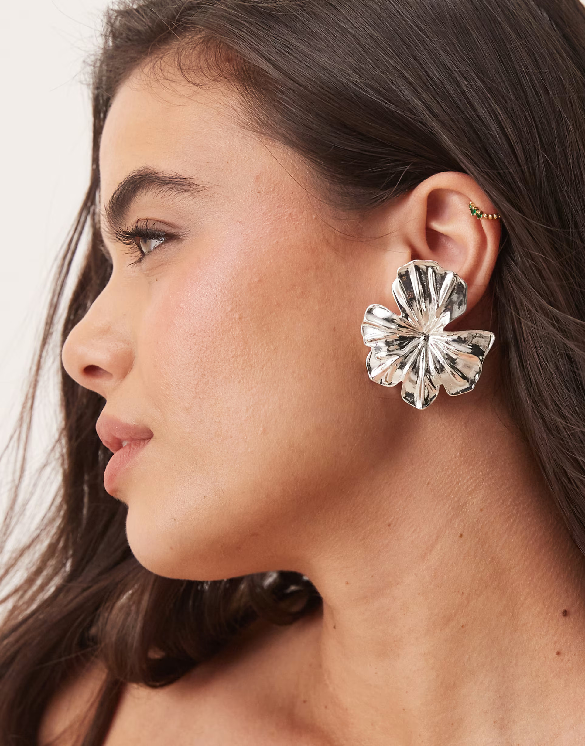 ASOS DESIGN stud earrings with hibiscus floral design in silver tone | ASOS (Global)