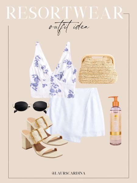 This resort wear outfit idea includes an embroidered tank paired with a wrap skirt, strappy straw sandals, sunglasses, a straw purse, and body oil. 

Ootd, spring outfit, vacation outfit, ootd

#LTKstyletip #LTKfindsunder50 #LTKshoecrush