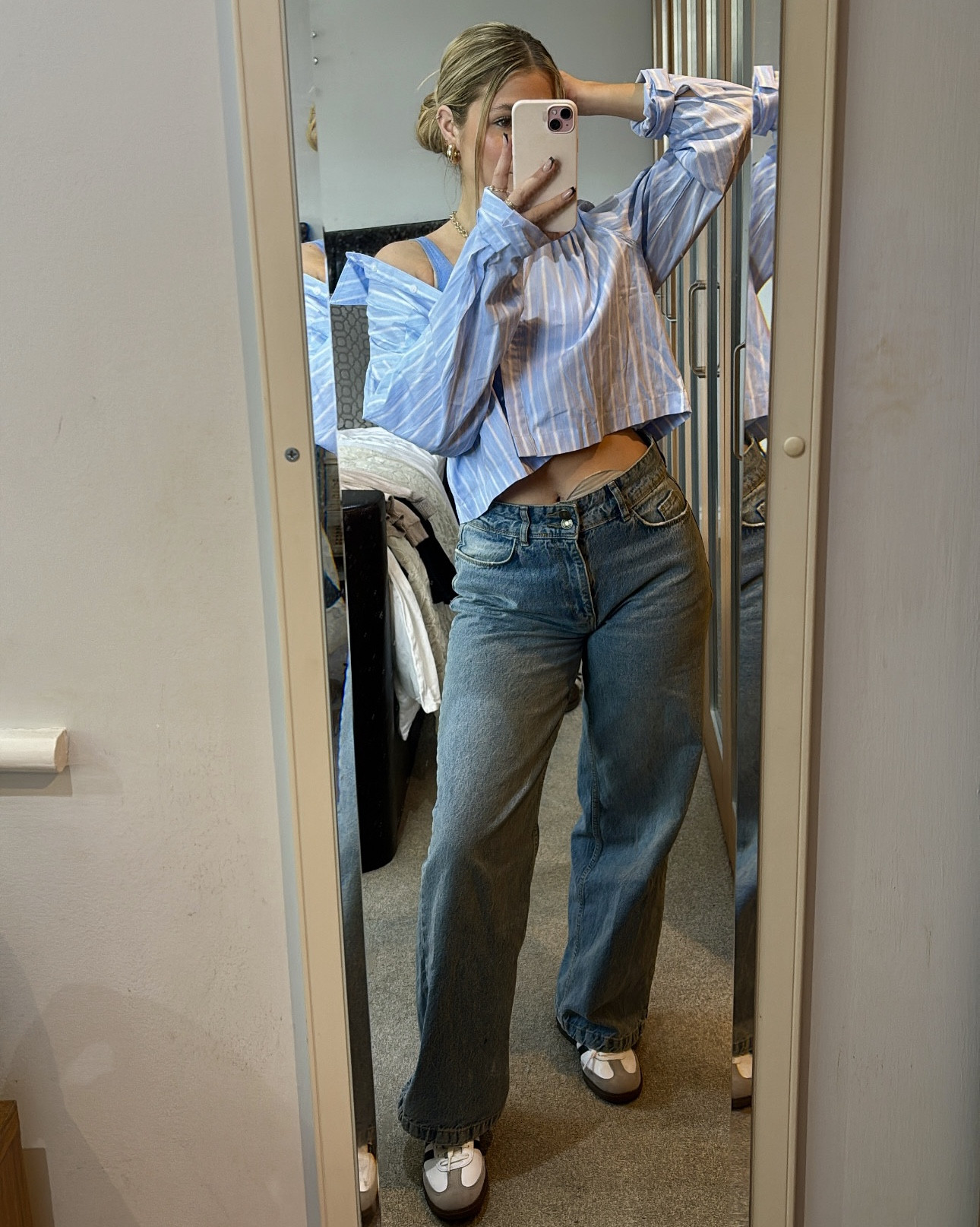 Blue pinstripe shirt // adidas sambas // jeans // street wear  

#LTKSeasonal #LTKshoecrush #LTKstyletip