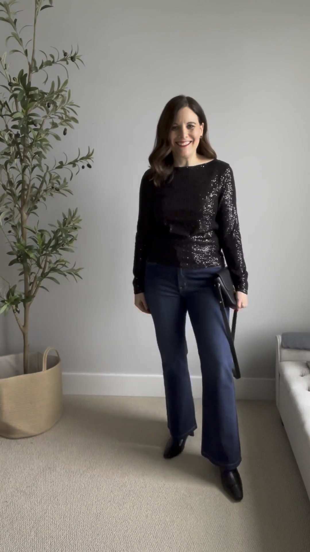 If a sequin top is a new style for you and out of your comfort zone, pair it with pieces you know and love to make the outfit feel familiar and comfortable. Here I’m pairing it with blue flare jeans and black ankle boots. This look is a perfect outfit for a New Year’s Eve neighborhood party. It’s festive casual. 
FIT: Size up in this LOFT sequin top. I'm in a large with 36-B bust. Size up one in the jeans. I'm in the short length to wear with flats at 5'6". 

 

#LTKHoliday #LTKOver40 #LTKMidsize