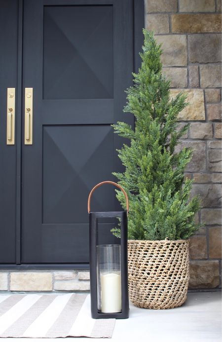 The BEST outdoor faux cedar tree. Ours has not faded in full sun and still looks real after harsh winters for over 3 years! 

#LTKSeasonal #LTKhome #LTKHoliday