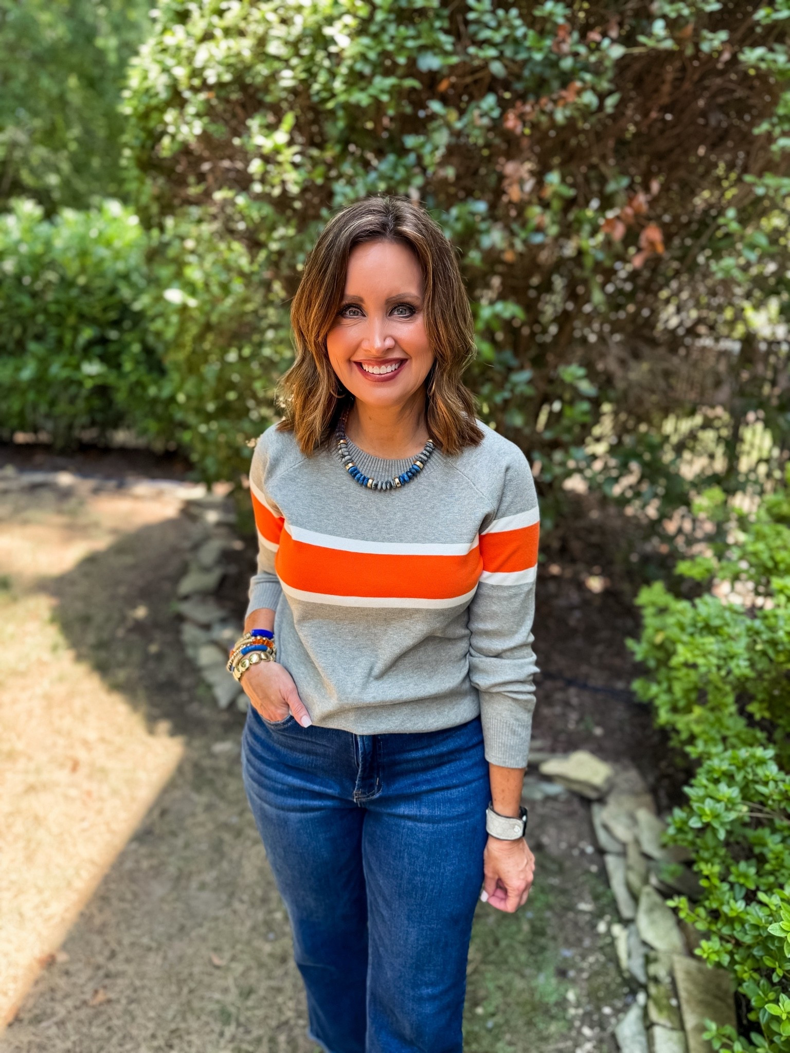 Game day outfit 
Orange and white sweater 

Use code LAURA on necklace and earrings

#LTKootd #LTKU #LTKOver40