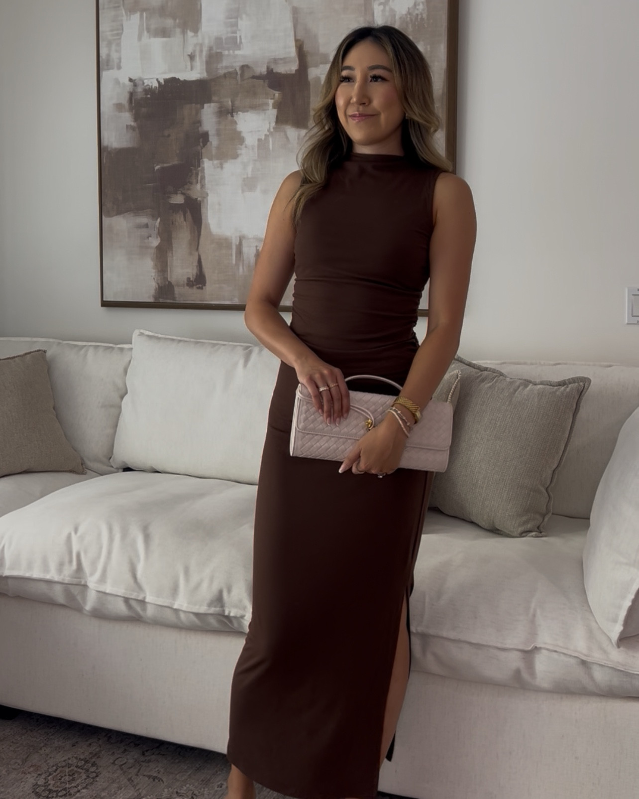 This stunning two piece set is on repeat in my wardrobe! The ruche detail on the skirt paired with the slit make this look effortlessly sexy. The top and skirt are versatile pieces because they can be worn together or separately! Makes the perfect date night outfit or going out outfit. TTS - I’m 5’8” and wearing a S. The look for less Bottega Veneta long andiamo intrecciato leather clutch is a great dupe at a fraction of the cost!

#LTKFindsUnder50 #LTKSeasonal #LTKStyleTip