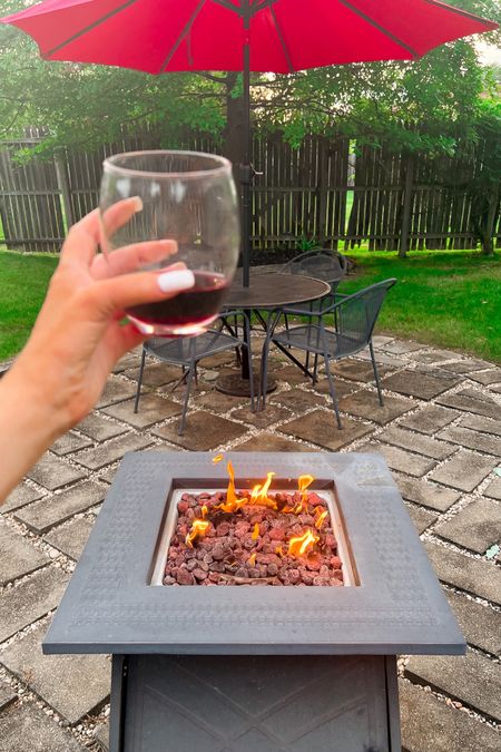 This fire pit from Amazon Home is under $200. Over two years old and still going strong! Perfect for fall outdoor activities - unbreakable wine glasses - red Solar LED umbrella - Amazon Finds - Amazon Deals 

#LTKSeasonal #LTKhome #LTKsalealert