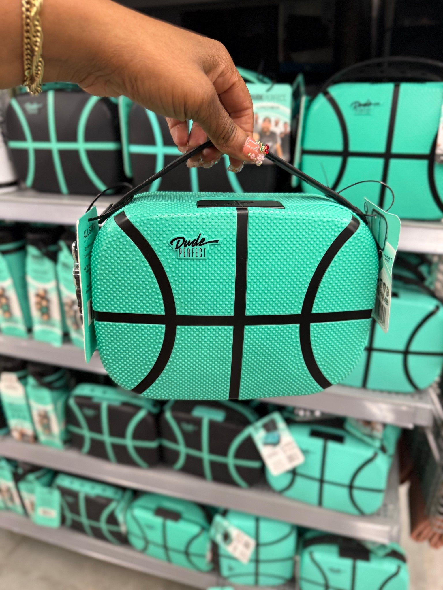 Y’all… Dude Perfect is having a moment again.  
Found these basketball lunchboxes at Walmart today.  
The mint color is everything.  