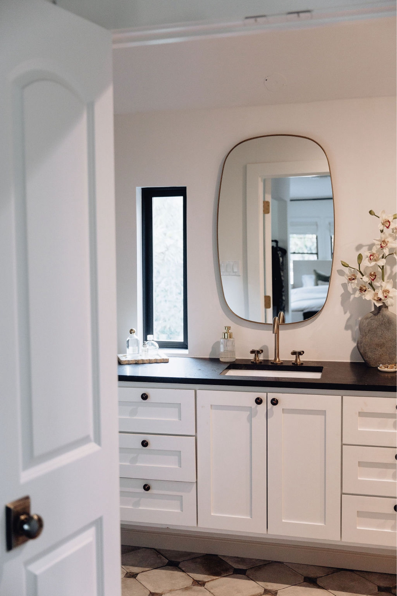 Bathroom // bathroom decor, bath, powder room, home decor, modern home decor, mirror, floating shelves, shelving, vanity, wall art, modern art, decorating, towels, rugs, neutrals, neutral home, decor, modern, minimalist, minimalist style, wall hanging decor, boho decor, neutrals, interior, interior design 
