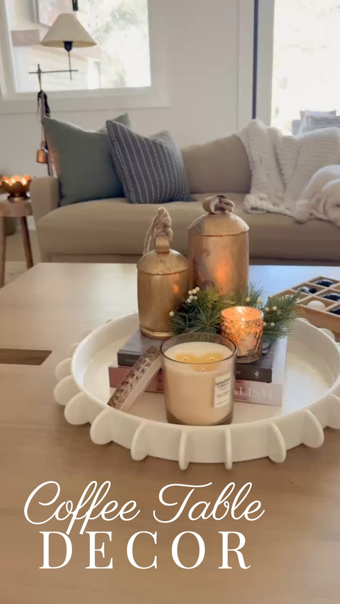 Cozy moments by candlelight ✨ The perfect mix of sandalwood vanilla, soft golds, and greenery to bring that calm, festive glow home this season. Style your coffee table with layers of warmth — candles, bells, and books always do the trick 🤍

Shop my favorite candles, trays, and holiday accents here!
#porcheandco #coffeetablestyling #holidayhome #neutralchristmasdecor #modernclassicstyle #homedecorfinds

Need even more styling or interior design help inside your home?! Visit our Online Interior Design Studio and one of our designers would love to help! Secure your packages today 🏡 —> https://porcheandco.com/edesign



#LTKHoliday #LTKSeasonal #LTKHome