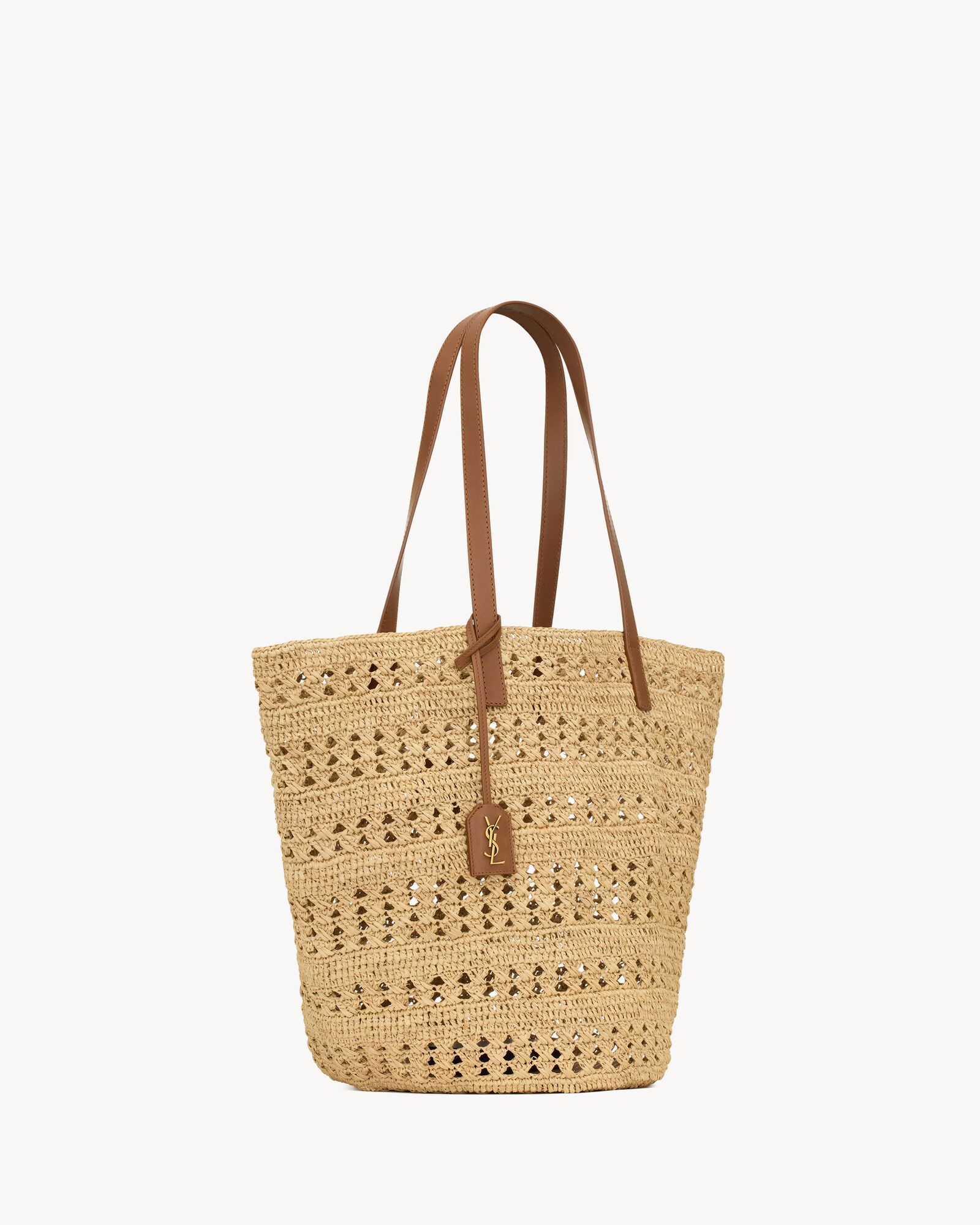 Basket bag with leather handles, featuring a leather-encased key holder decorated with THE CASSAN... | Saint Laurent Inc. (Global)