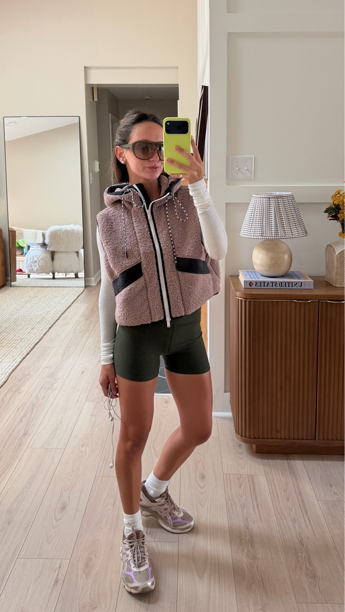 My exact shorts are 3 in Beyond Yoga but the color is old! XS longsleeve + small vest! Sunnies are the Luz from Jimmy Fairly
