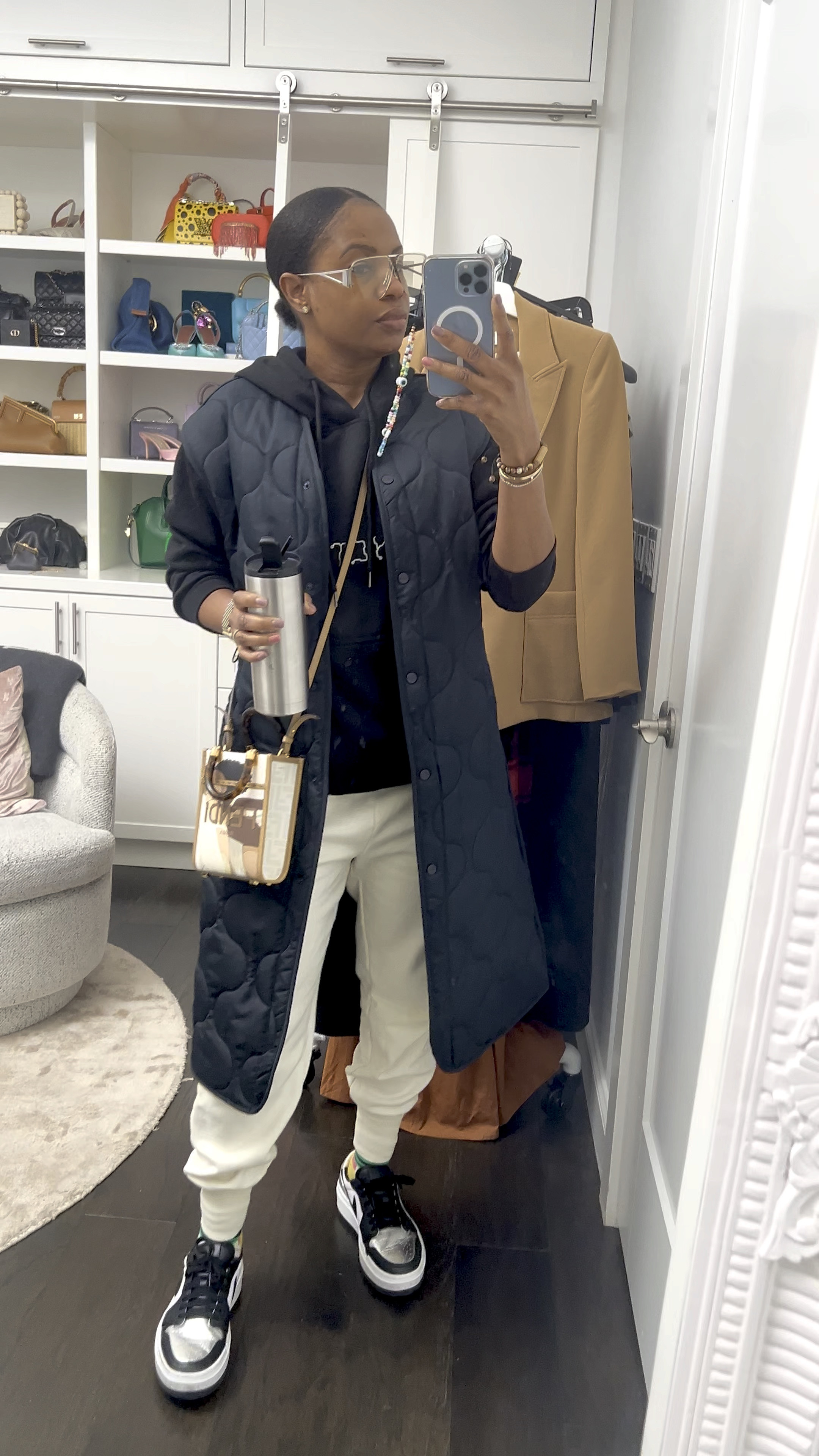 Soccer mom outfit of the day! You can never go wrong with a long vest and a stylish hoodie! And of course a pair of fabulous sneakers. 

#LTKfindsunder100 #LTKstyletip #LTKfitness