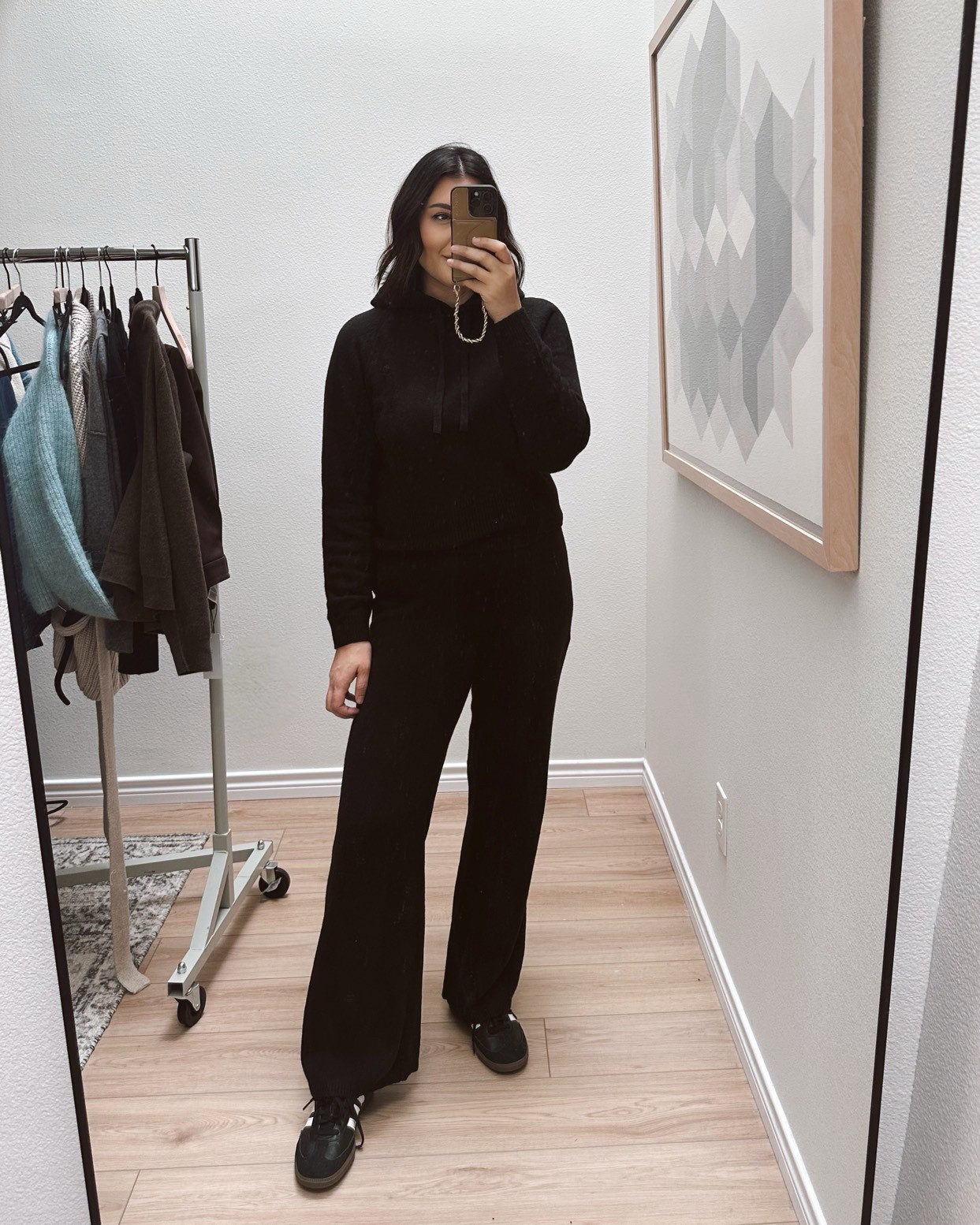 I'm in the medium of the black hoodie, TTS. I'm in the large of the pants, I sized up for a looser fit / no lines when I wear them. 

I'm in the medium of the sweatshirt and pants. TTS. 

 