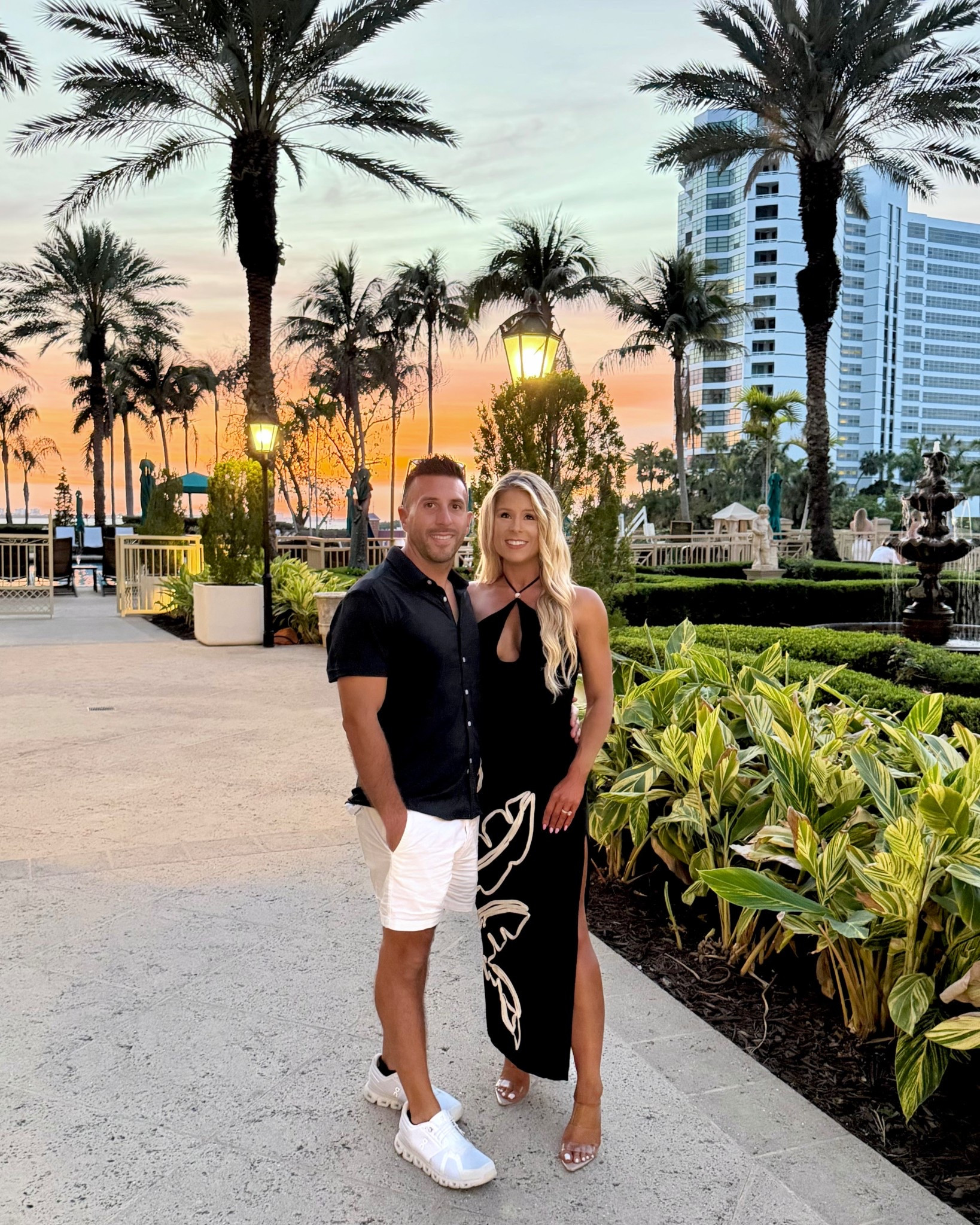 Black Halter Dress with floral design + side slit styled as a resort dress, summer date night dress, or vacation dress.

Maxi dress, tropical dress, black dress, summer dress, resortwear 2026, floral dress @Revolve 

#LTKootd #LTKTravel #LTKSeasonal