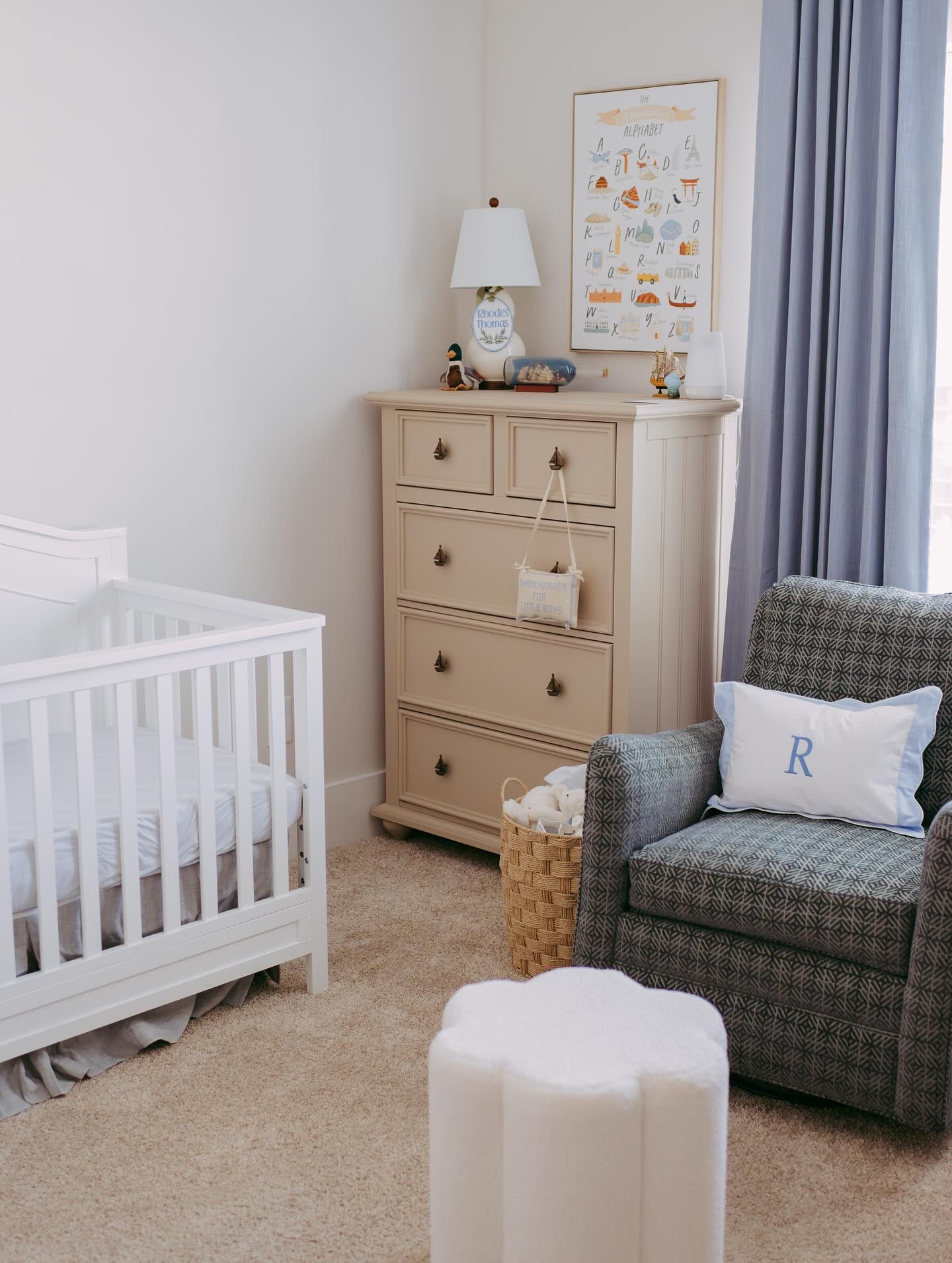 Before➡️After! 
This dresser has lived a few lives, and now it’s starting a new one in a nursery for my sweet friends’ baby boy. We stripped away the deep red and gave it a calm, cozy finish to match the rest of the space. The sailboat knobs were the perfect final touch.⛵️

#nursery #nautical #beforeandafter #furnitureflip #dressermakeover