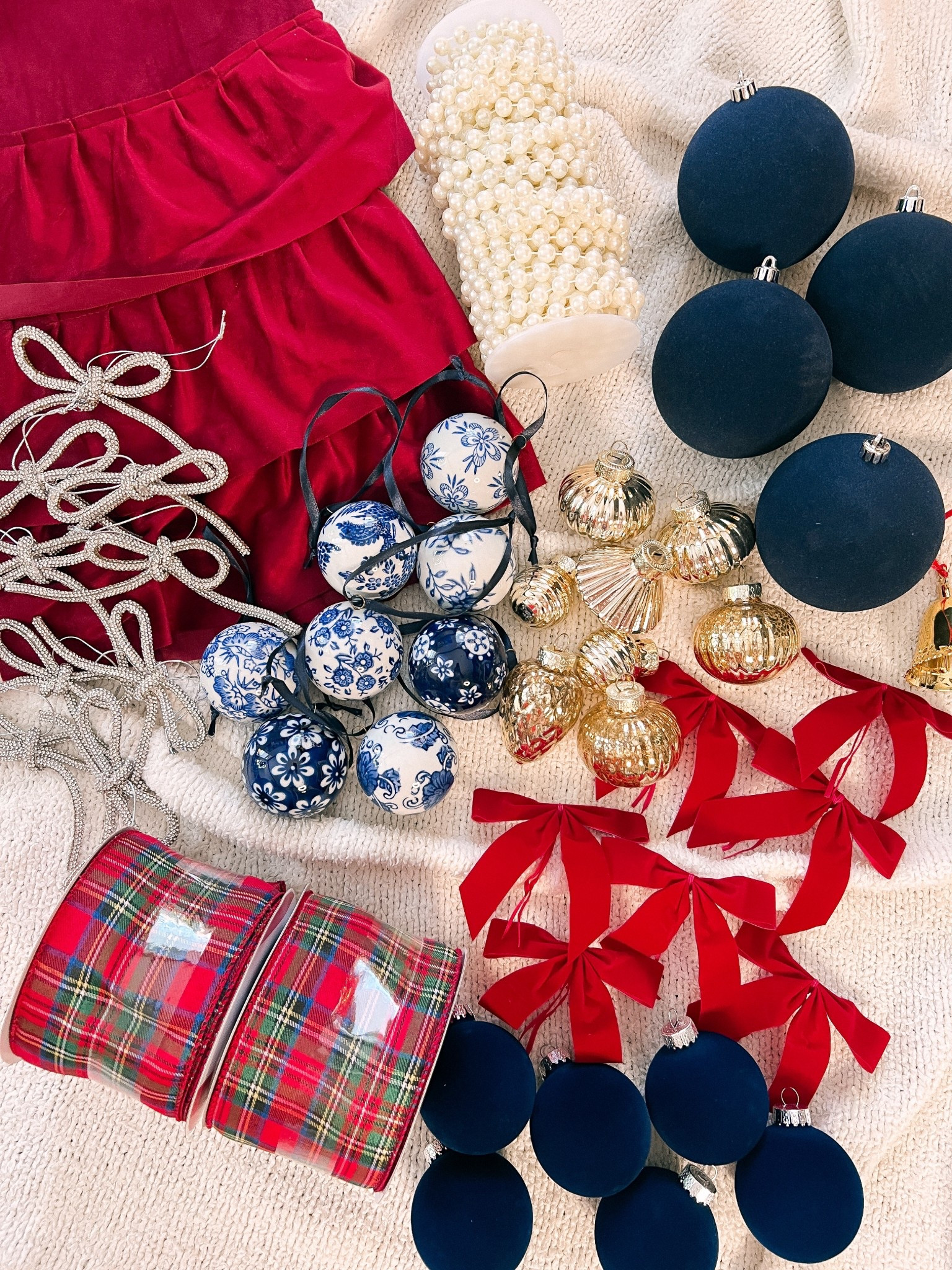 A classic Christmas 🎄❤️ Decorating the tree today! Doing a mix of grandmillennial chinoiserie ornaments and classic red tartan plaid ribbon. It’s definitely giving Ralph Lauren Christmas! 

Grandmillennial Christmas, classic Christmas decor, red bows, rhinestone bow ornaments, velvet tree skirt

#LTKSeasonal #LTKHoliday #LTKHome