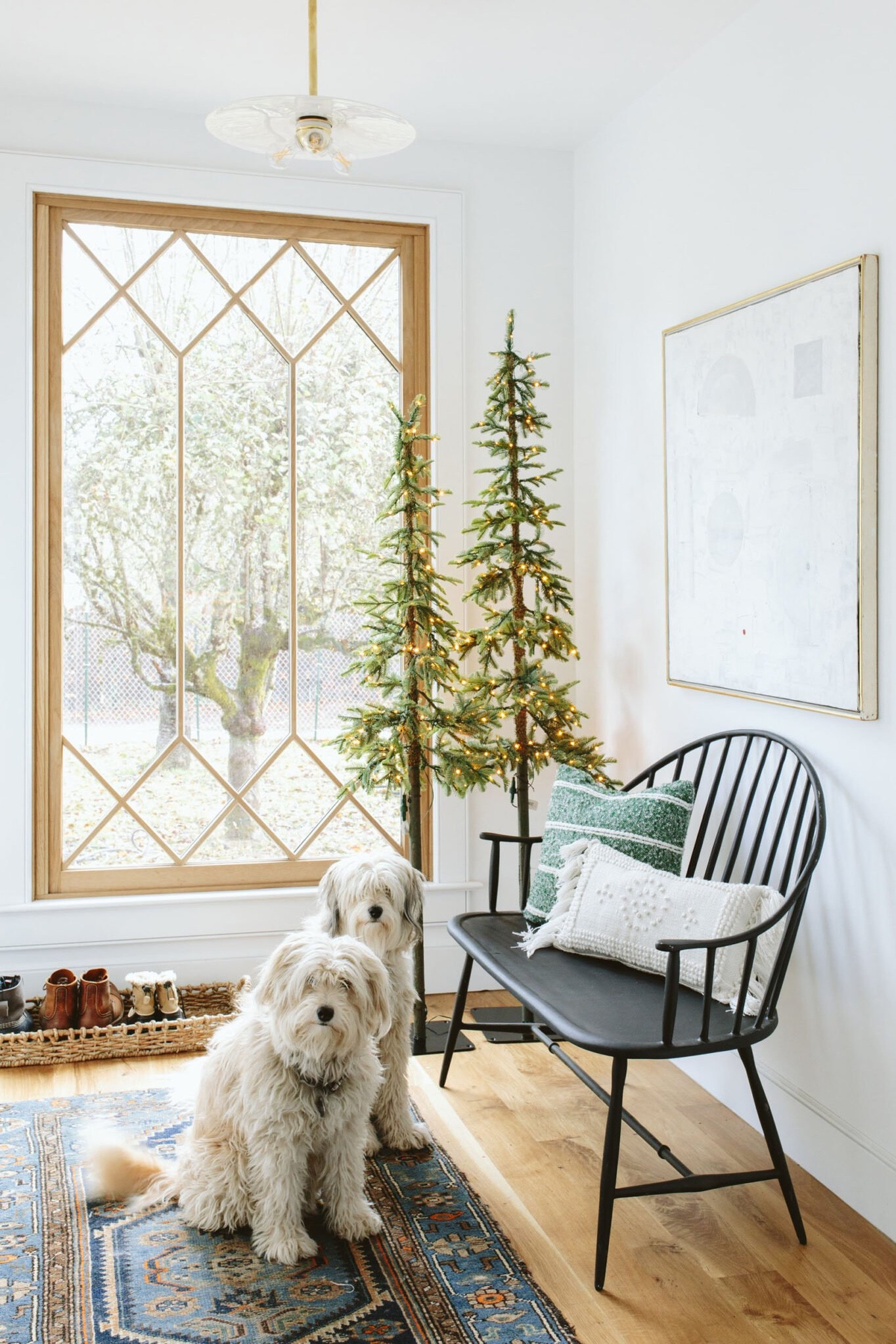 Last year, just put two pre-lit alpine trees in the corner + two pillows and called it a day, but those dogs are really selling the space. I think these Alpine trees (these from Terrain and others around the house from Target) are my favorite addition to the holiday decor market. They can be shoved in so many corners, don’t need decor, and just add life at night when the lights are off.

#LTKHoliday #LTKhome #LTKfamily