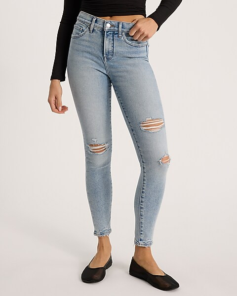Mid Rise Light Wash Ripped Hyper Sculpt Skinny Jeans | Express