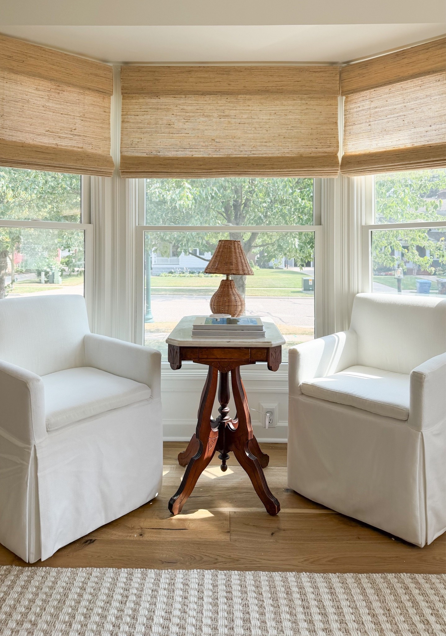 My little bay window home office! Table is antique. Woven shades are color “beige” + privacy liner + outside mount. Code HANNAHJANSMA for 22% off. Lamp is the small.

#LTKHome