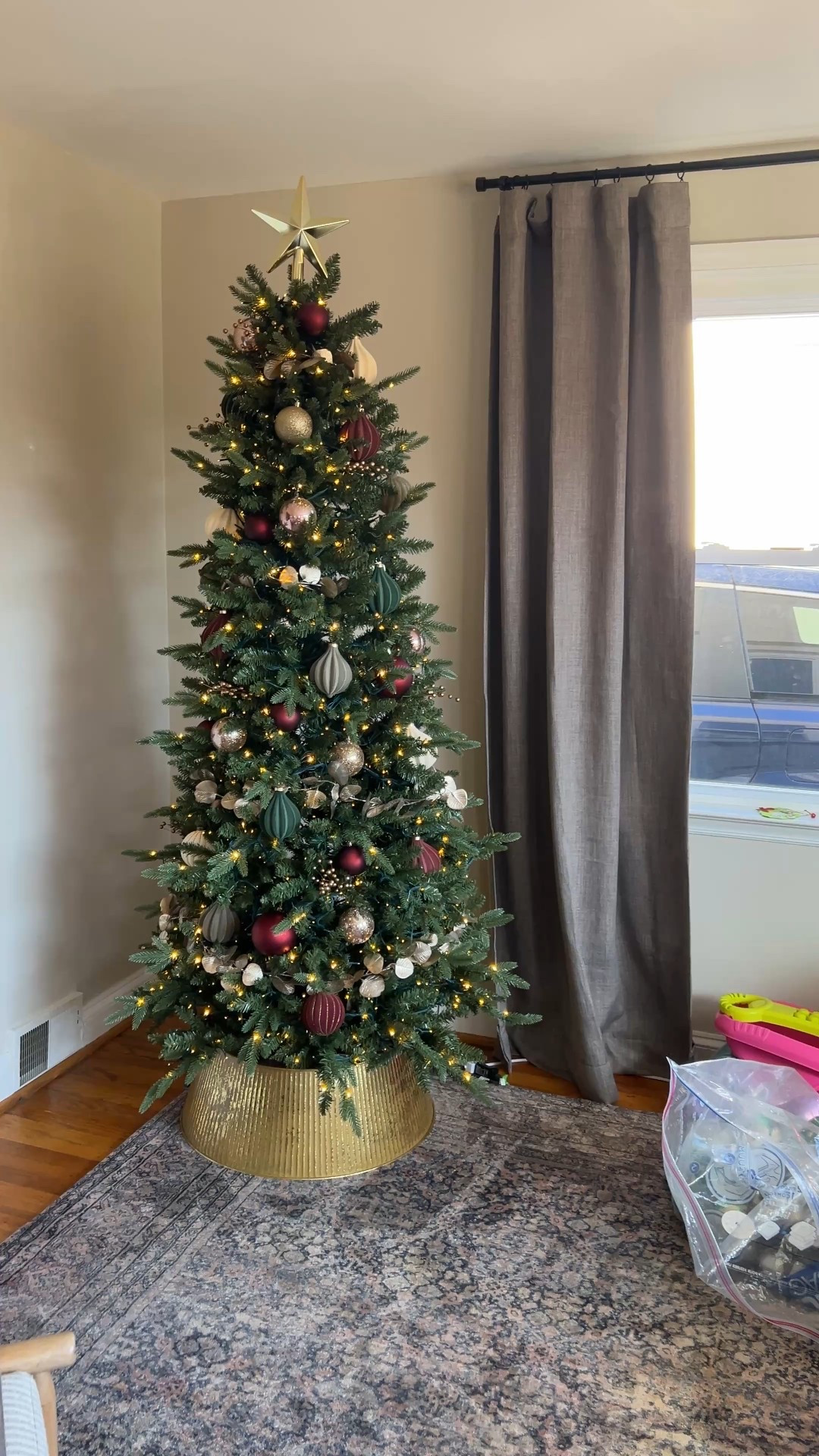 My Christmas tree! This is a slim tree, that doesn’t feel too skinny and works perfectly in smaller spaces (like my small living room). I love the realistic branches. 

#LTKHoliday