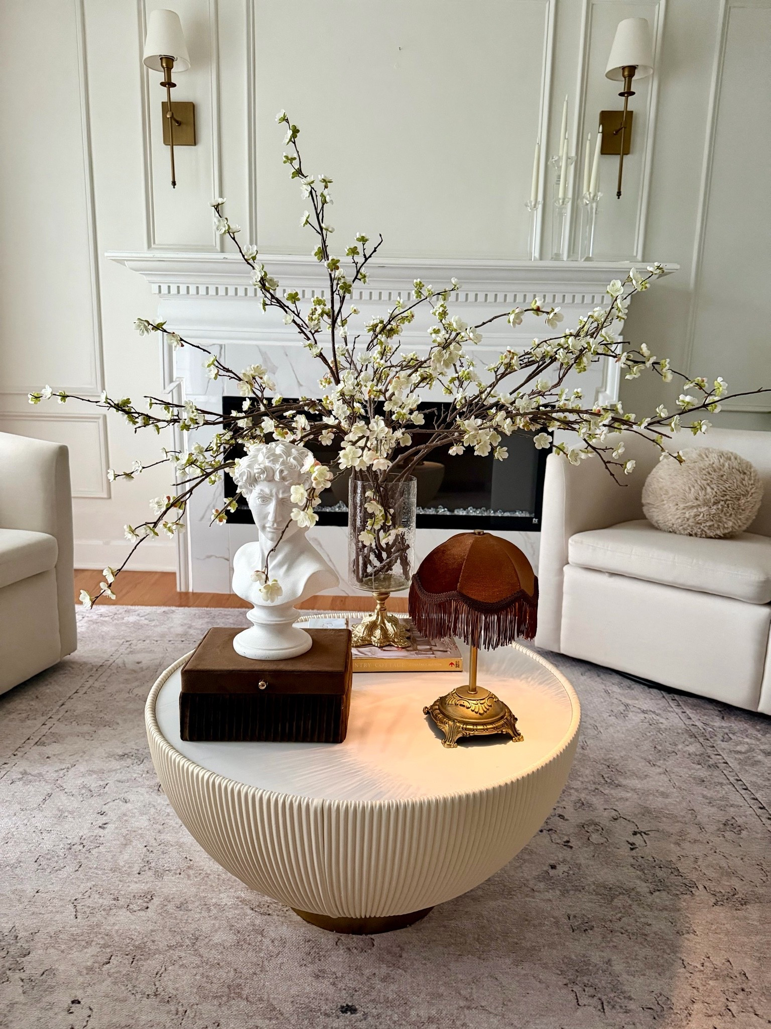 Coffee table styling with vintage pieces. Crushing on brown right now

#LTKSaleAlert #LTKHome #LTKvlog