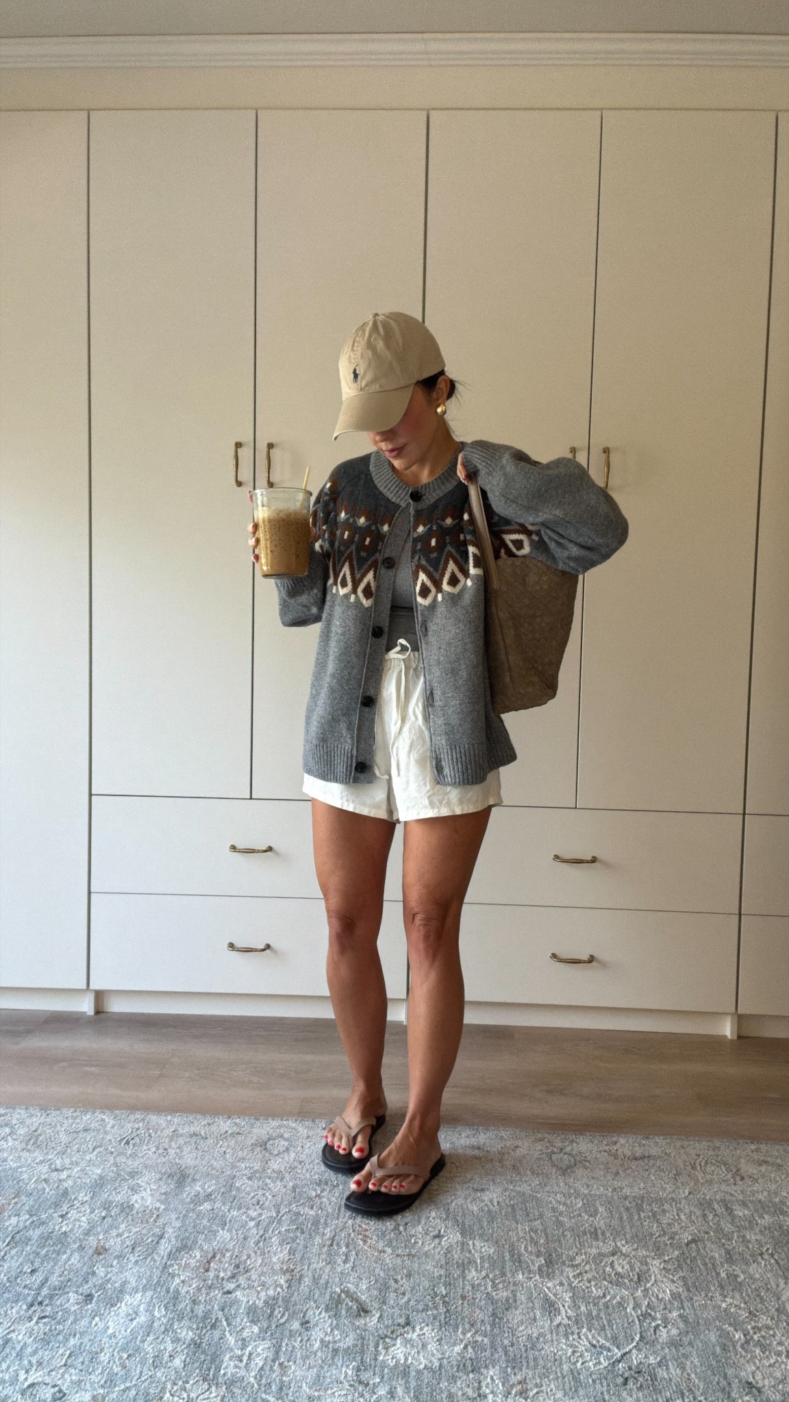 Cardigan: sized up to a large 
Tank in a xs 
Shorts in a small
Shoes true to size 


Chilly mornings in South Florida call for layers that feel easy, not heavy 🤍
This is one of those outfits I reach for when the air is cool but the day still warms up — light shorts, a cozy layer, simple sandals, and nothing that needs overthinking.

Pieces like this make getting dressed feel effortless.
Worn often. Chosen well.



#southfloridastyle
#effortlessstyle
#everydayuniform
#simplesstyle
#coastalliving
#neutraloutfit
#casualoutfit


#LTKootd #LTKPetite #LTKFindsUnder50