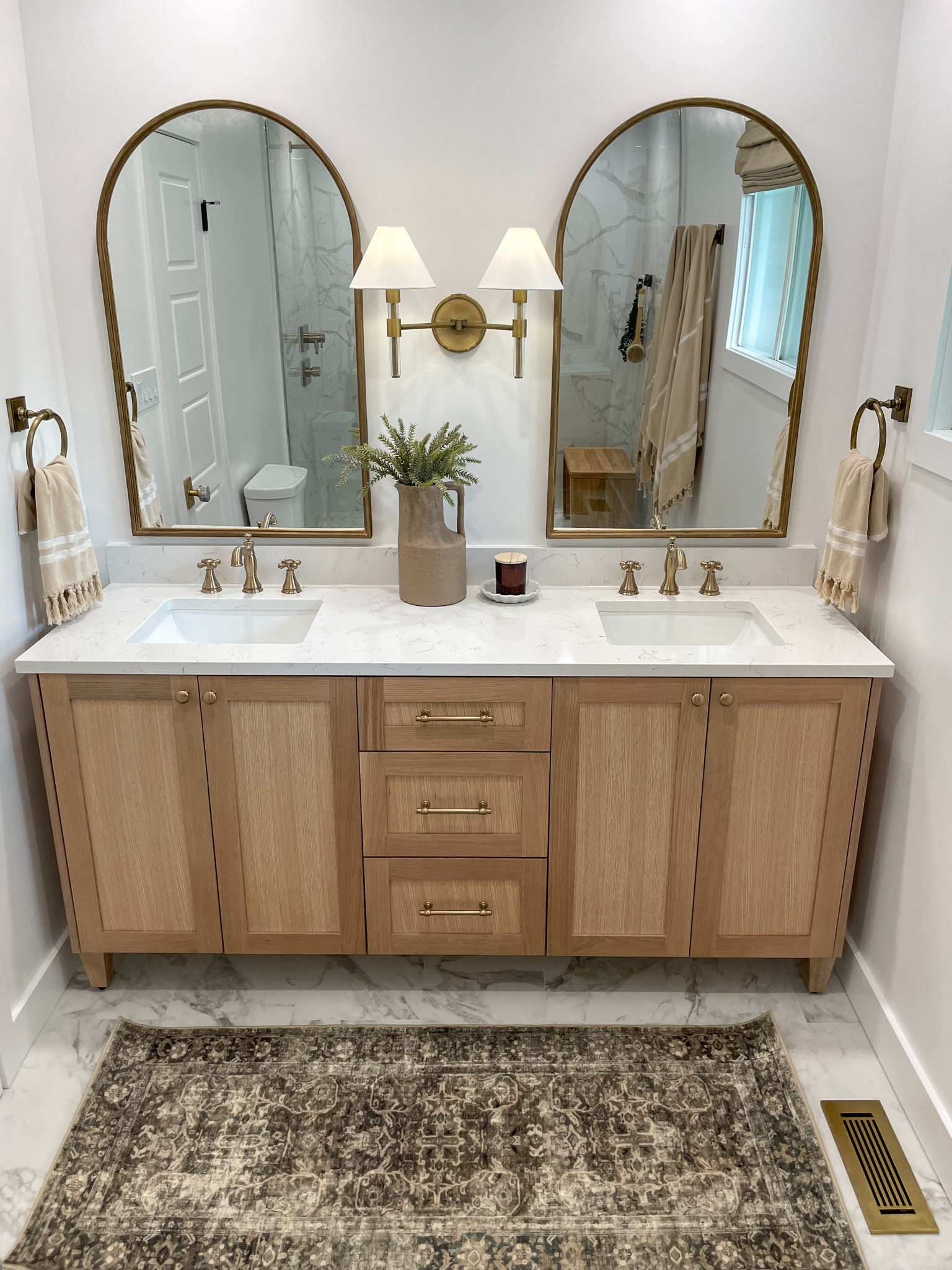 Shop my primary bathroom!

Bathroom, arched mirror, sconce, champagne bronze, accent rug, faucet, shower bench, bathroom, primary bathroom

#LTKhome 

#LTKstyletip
