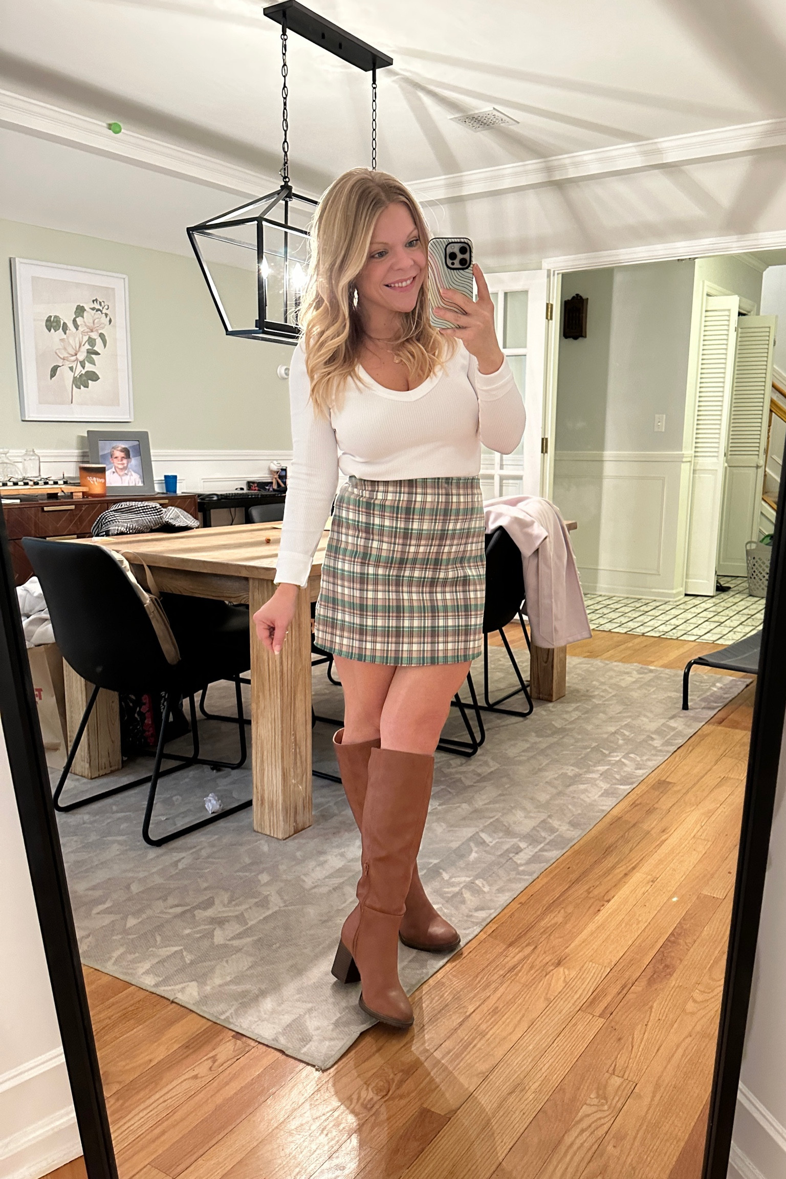 I love buying new and mixing with thrifted items! I picked this Zara skirt up at the thrift store and linked a bunch of them available on Poshmark right now! Also I kept the brown boots 🥰♥️ my top is from Walmart! I linked the crew neck version!!  Love them! 

#LTKSeasonal #LTKfindsunder50 #LTKstyletip