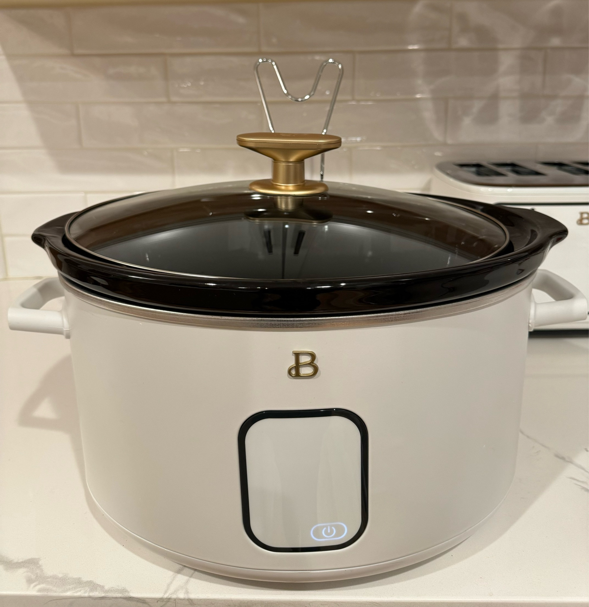 I am obsessed with my new white crock pot from Beautiful Kitchenware!! I have had the coffee pot and toaster for a year and I absolutely love them both!! I have been wanting the crockpot but the last time I checked it was sold out!! It’s digital, has a lid holder and is so pretty with the gold accents. It’s under $50 at your local Walmart!

#LTKfindsunder50