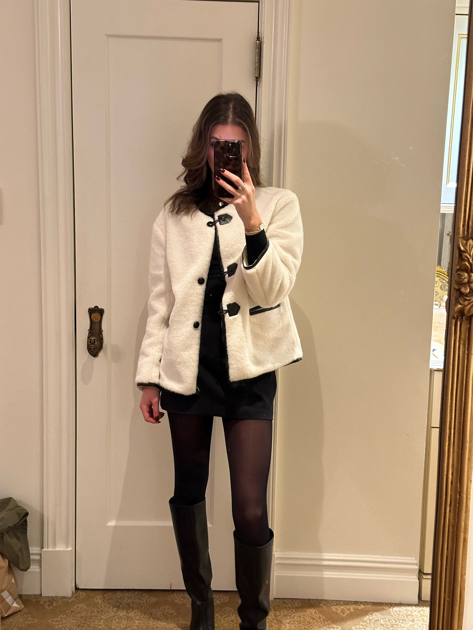 White fur jacket with black long sleeve top and black mini skirt with black tights and black tall boots. New York fashion. Fashion info. Cold weather outfit. NYC outfit. Amazon fashion. Affordable fashion. Vacation outfits. Cherry coded. Moto Boho. Minimalist outfits. Capsule wardrobe. Street style. Retro looks. Effortless elegance. Chunky boots. Statement coats. Cozy sweaters. Monochromatic looks. Natural glam. Winter outfits. Work outfit. Valentines. Ski outfit. Loungewear. Jeans. Affordable Fashionn

#LTKSeasonal #LTKTravel #LTKStyleTip