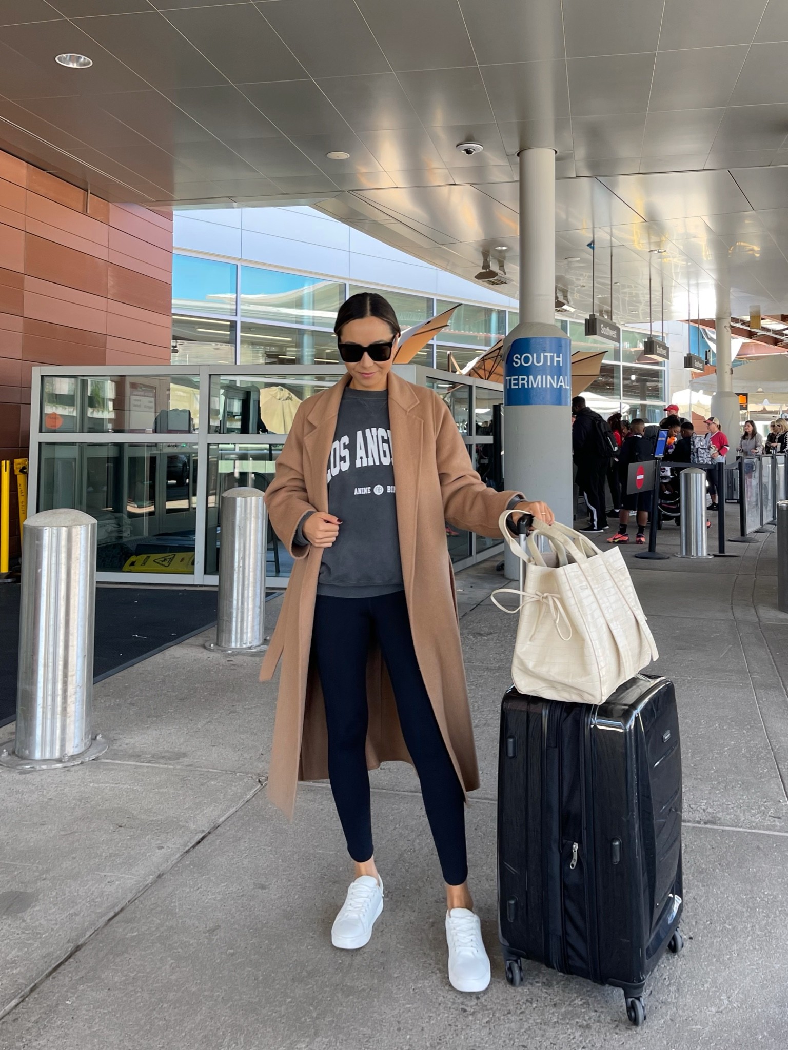 Airport outfit 
Camel coat xs 
Anine bing sweatshirt small
Leggings 
Sam Edelman Sneakers - size up if between sizes 
Amazon luggage 

#LTKunder100 #LTKstyletip #LTKtravel